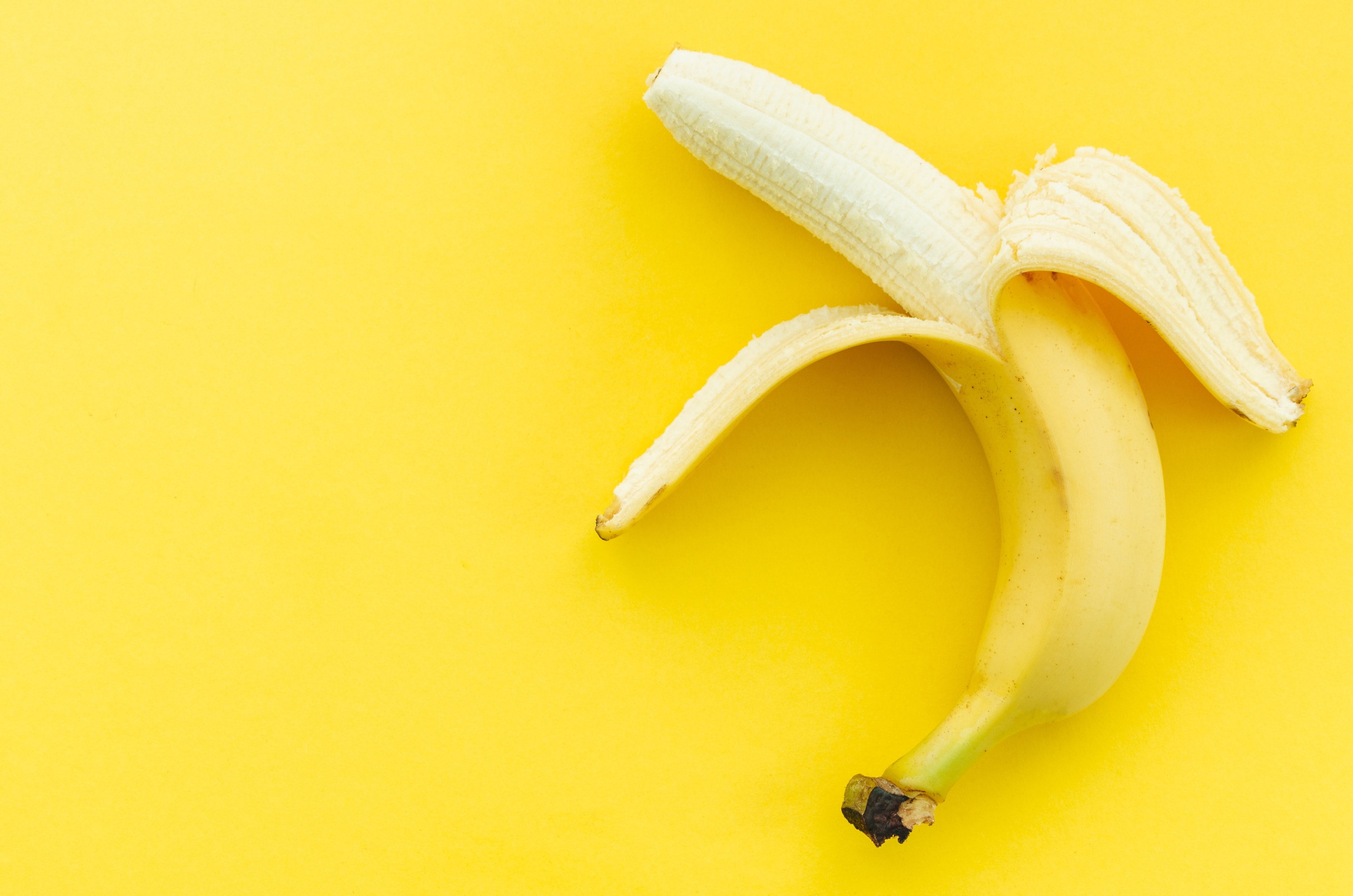 Banana on yellow background
