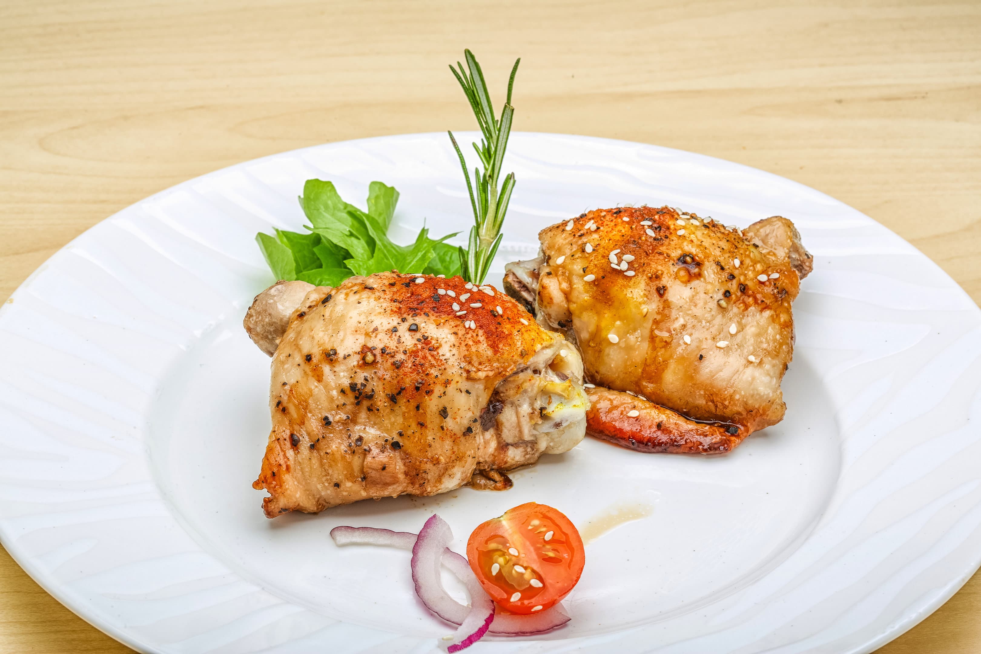 Boneless skinless chicken thighs air fryer with garnish