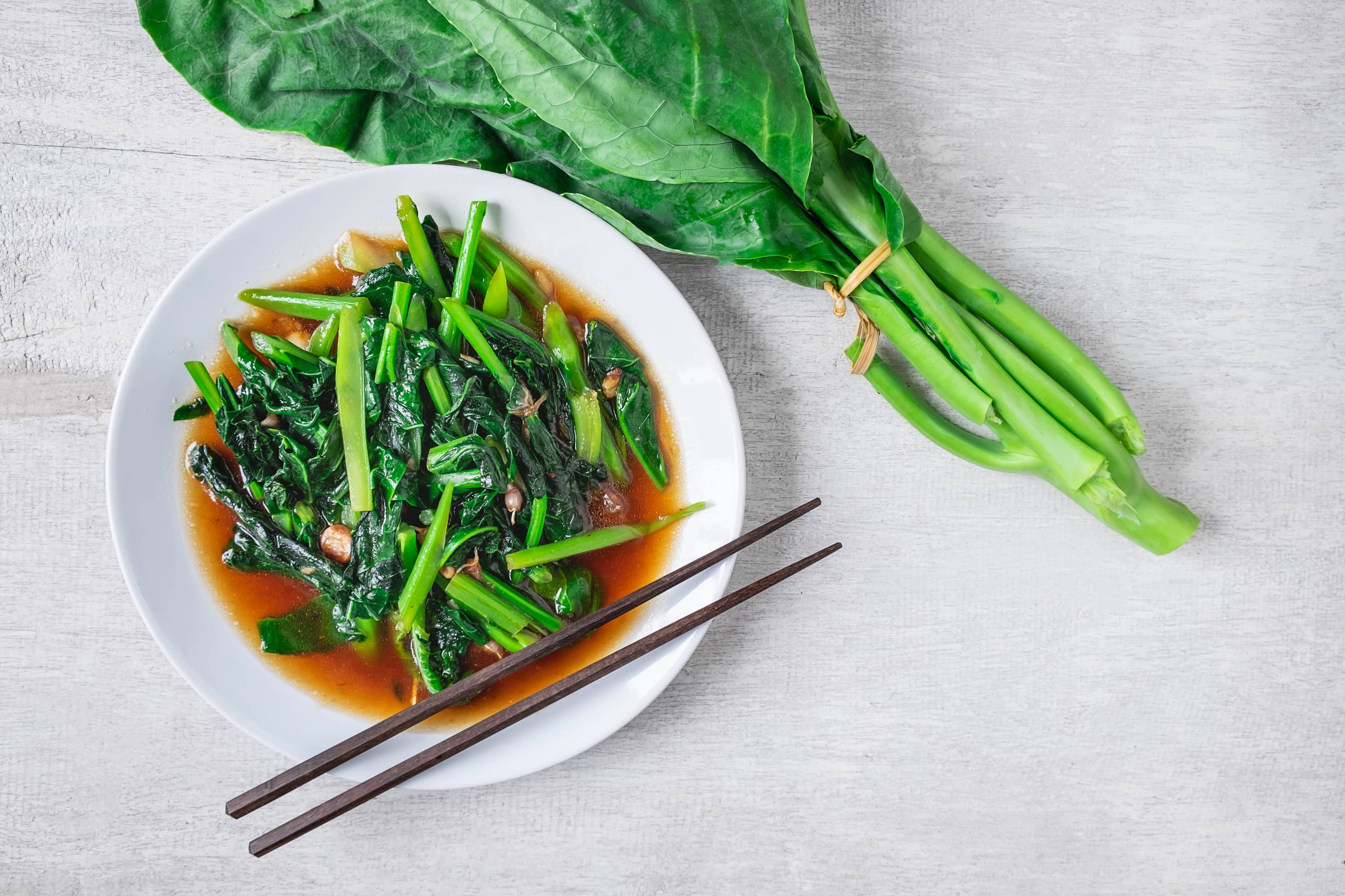 <a href="https://blend-of-bites.ghost.io/benefits-of-chinese-broccoli/">Chinese broccoli (Gai-lan)</a> stir fry with oyster sauce