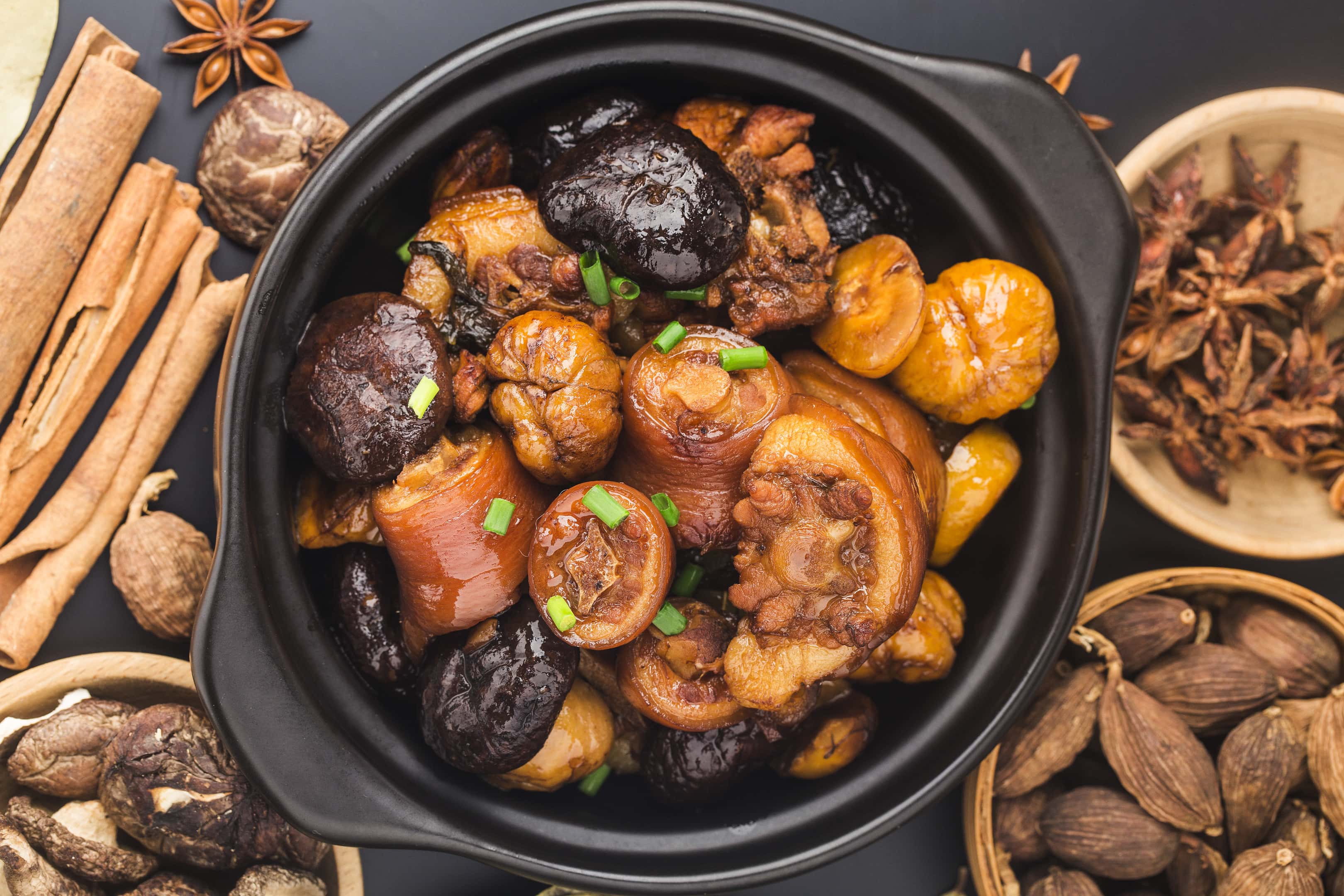 Chinese cuisine — braised chestnut pig tail with shiitake mushrooms