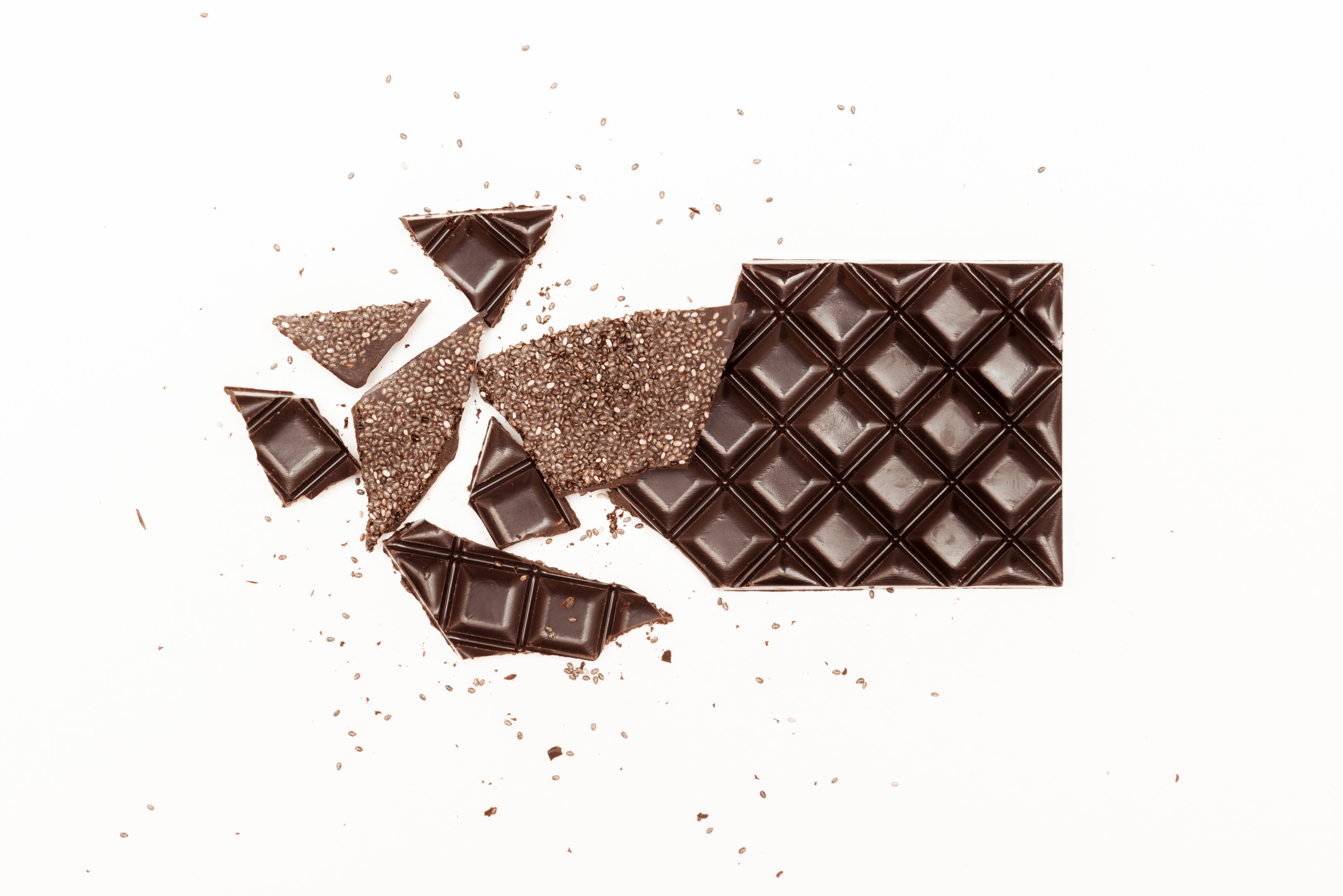 Cracked dark chocolate bar with chia seeds