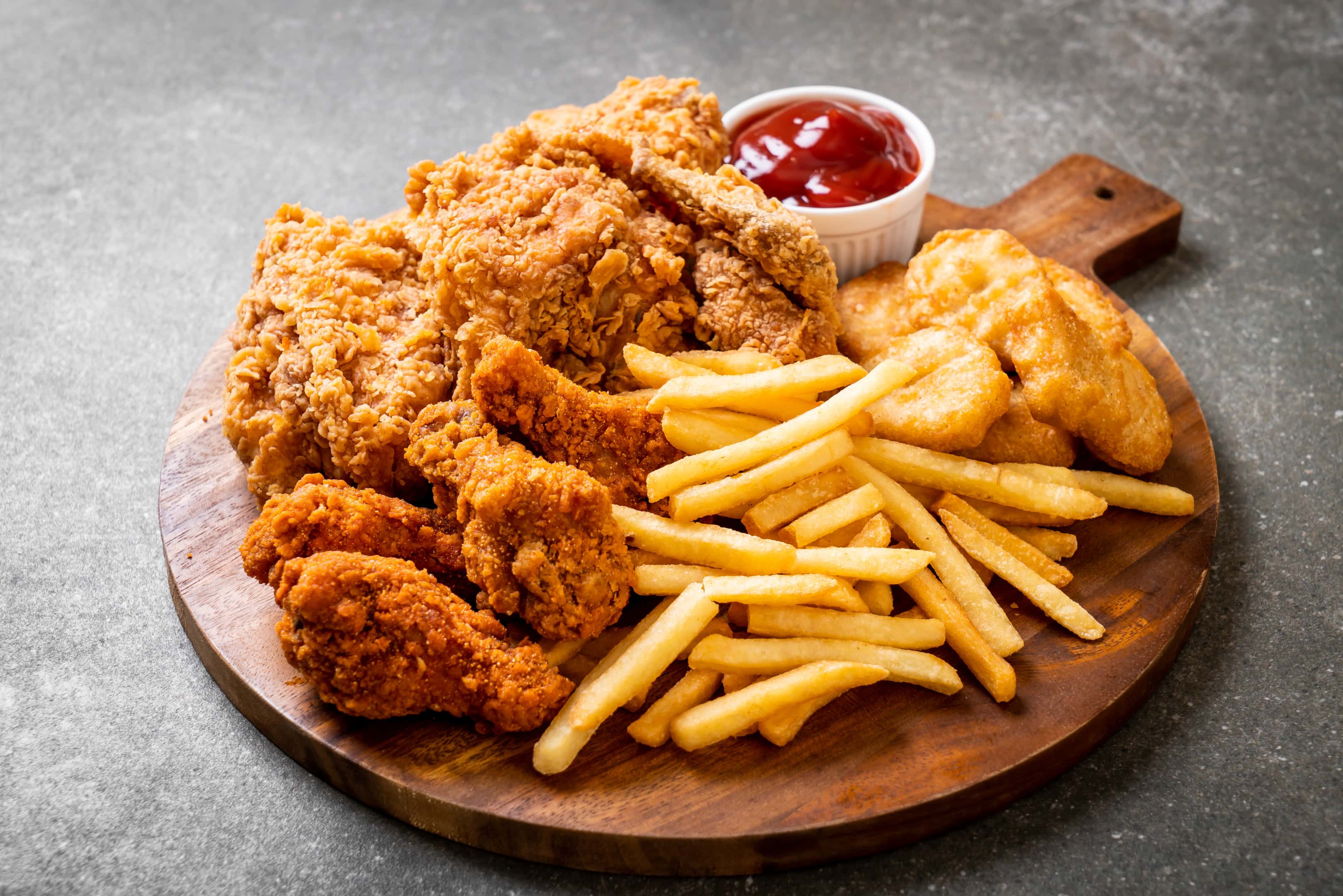 Fried chicken with french fries and nuggets