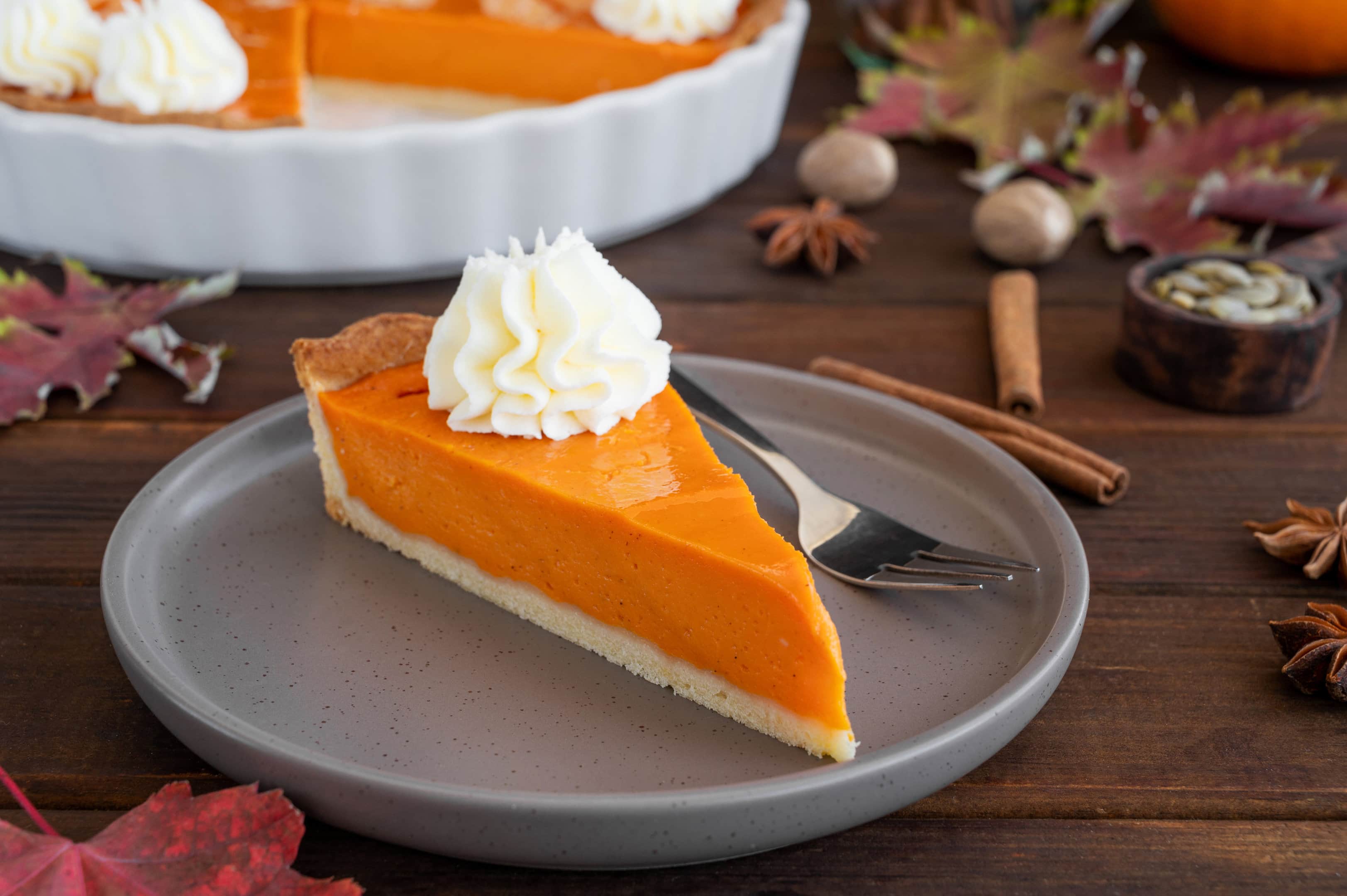 Homemade grandma's old fashioned sweet potato pie with whipped cream