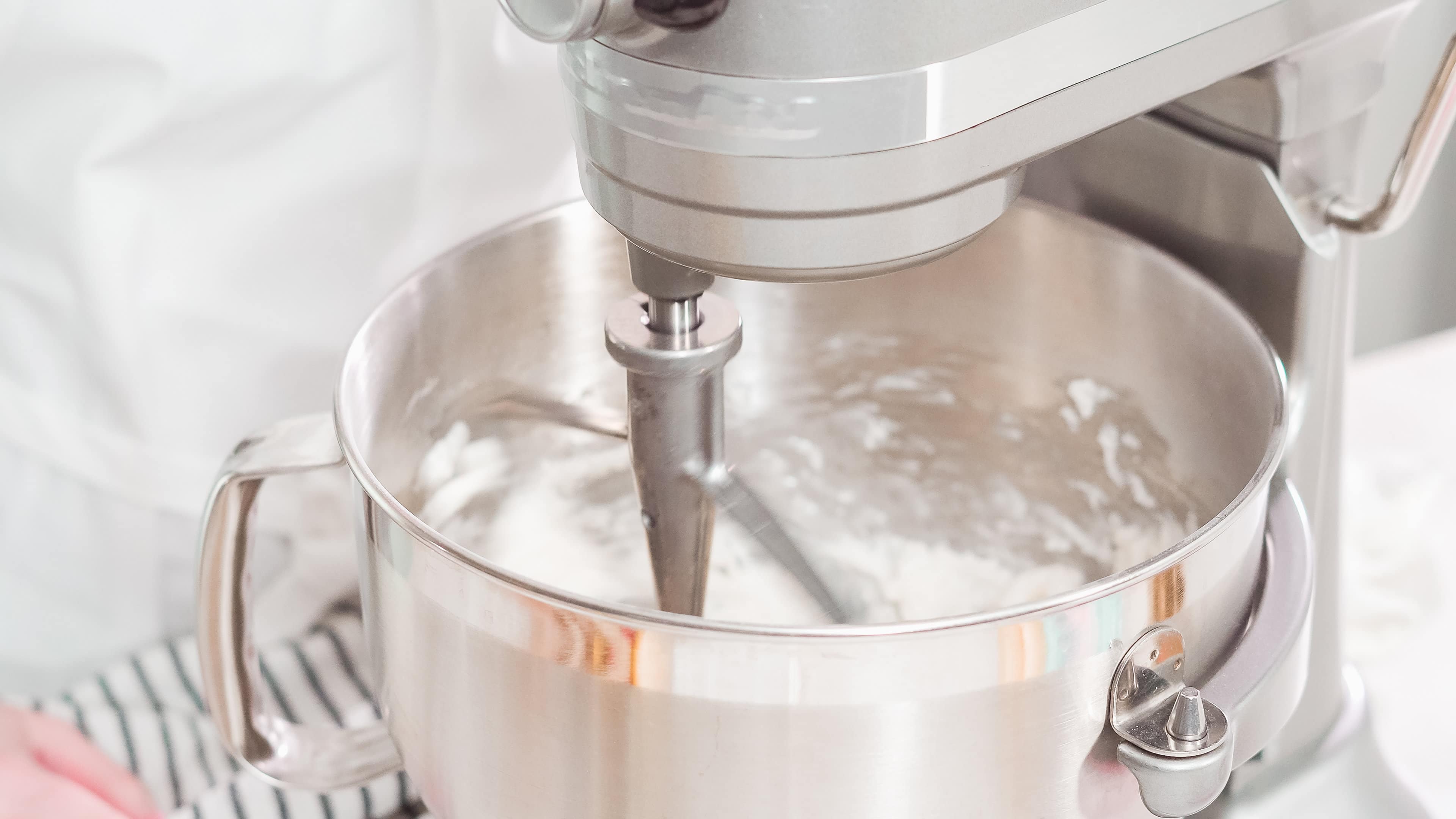 Ice cream maker mixing vanilla ice cream