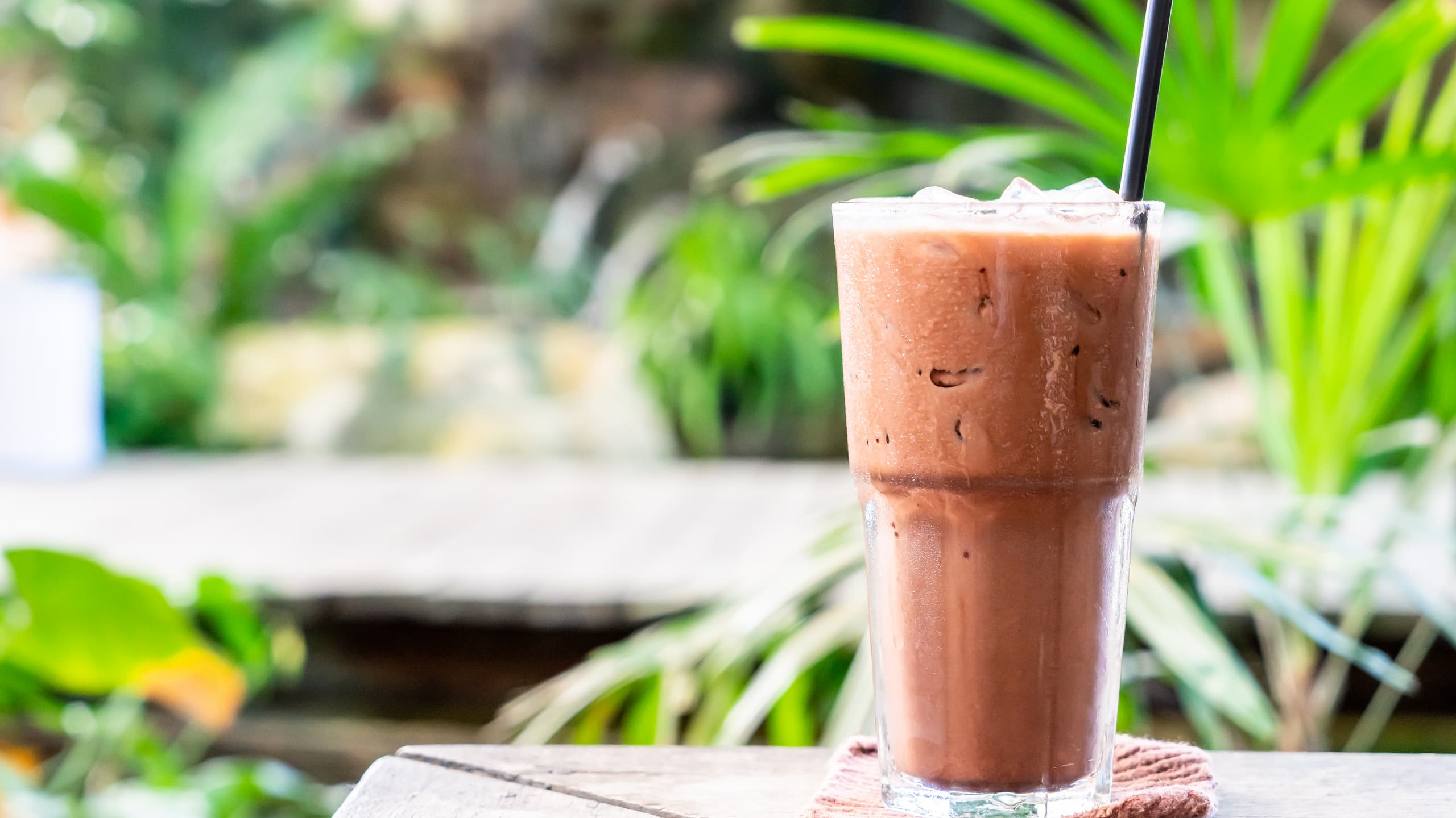 Iced Herbalife Shake glass with a straw
