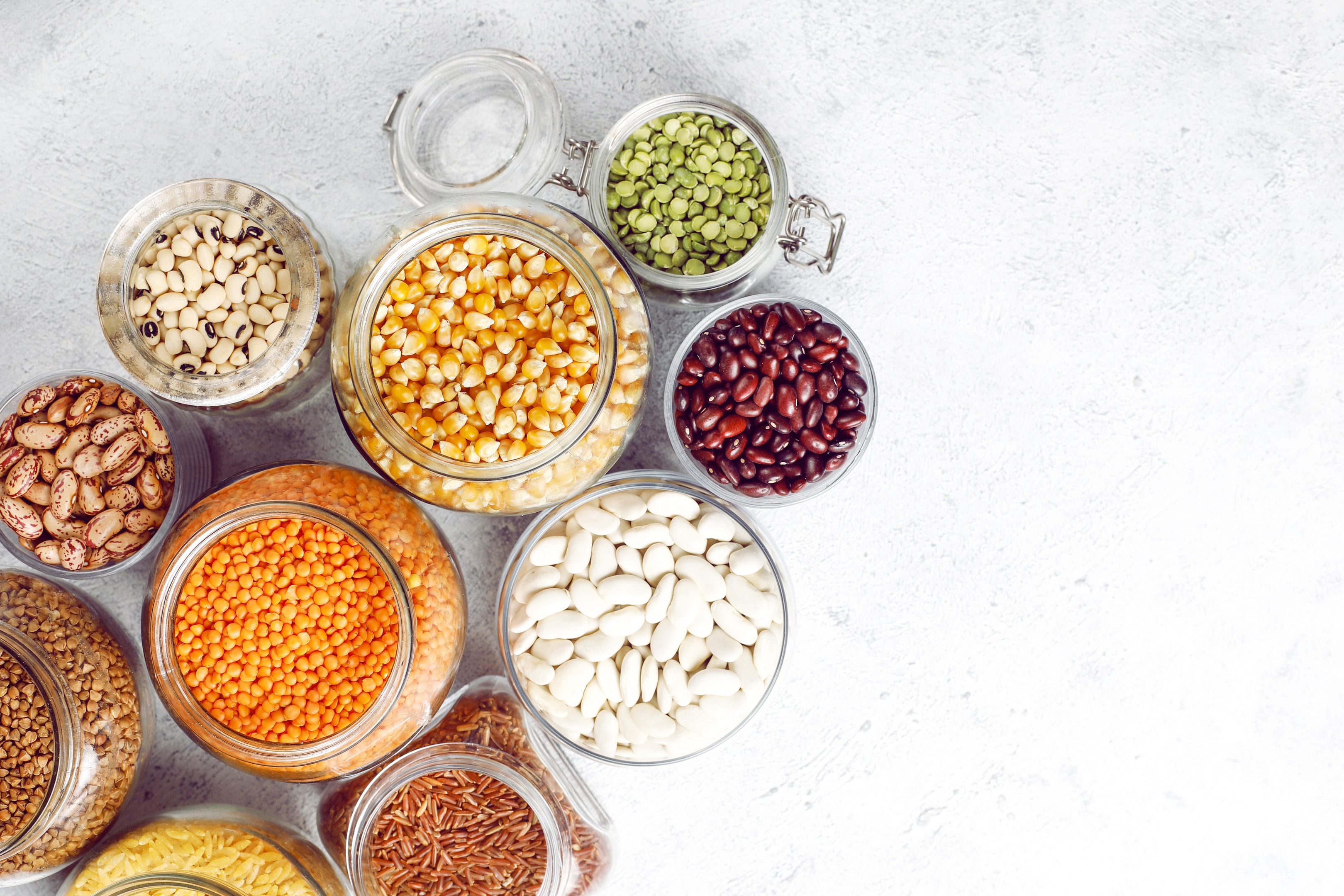 Legumes and beans assortment in different bowls