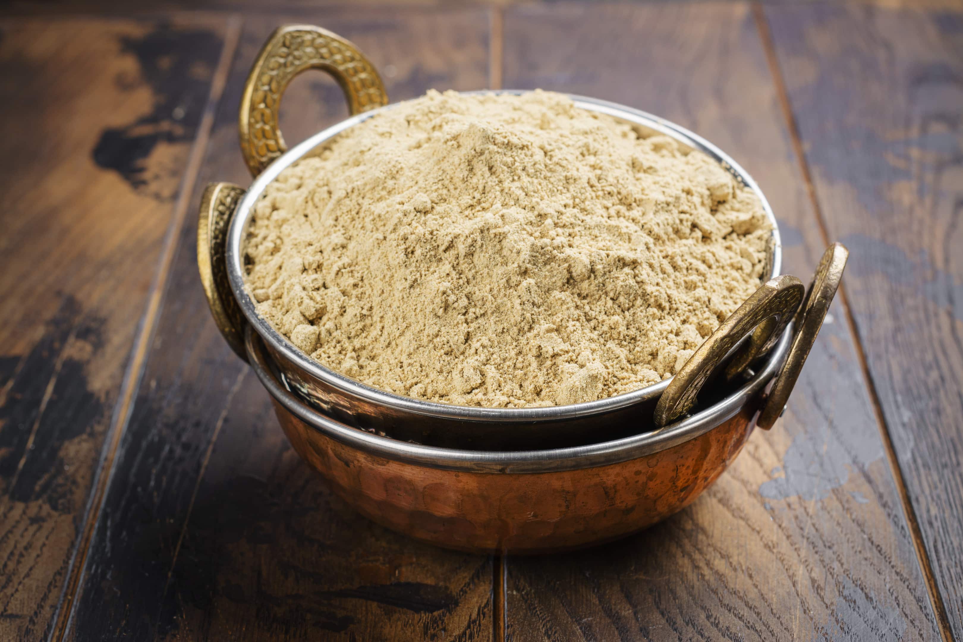 Mesquite powder in a metal bowl