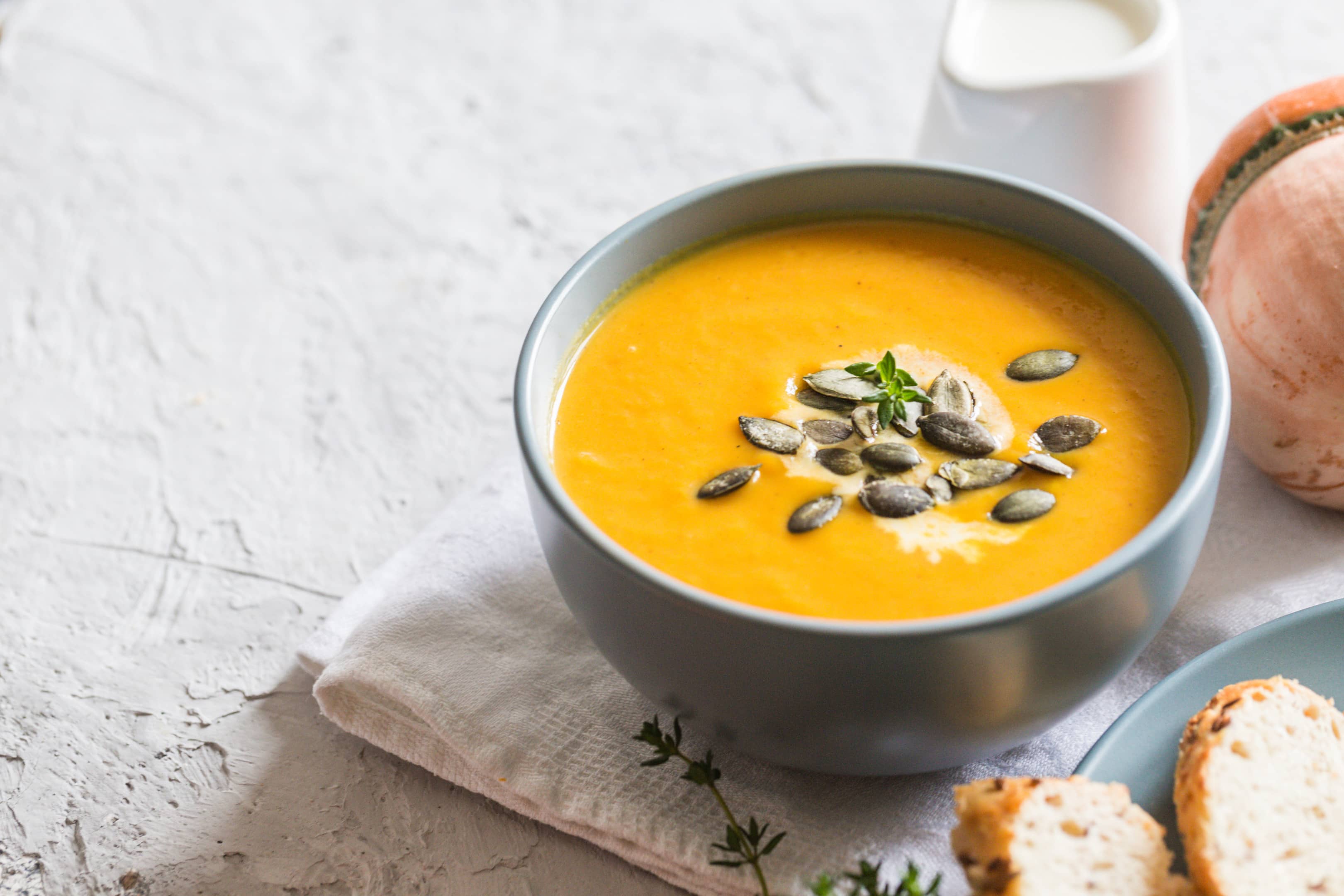 Pumpkin and cream soup with pumpkin seeds