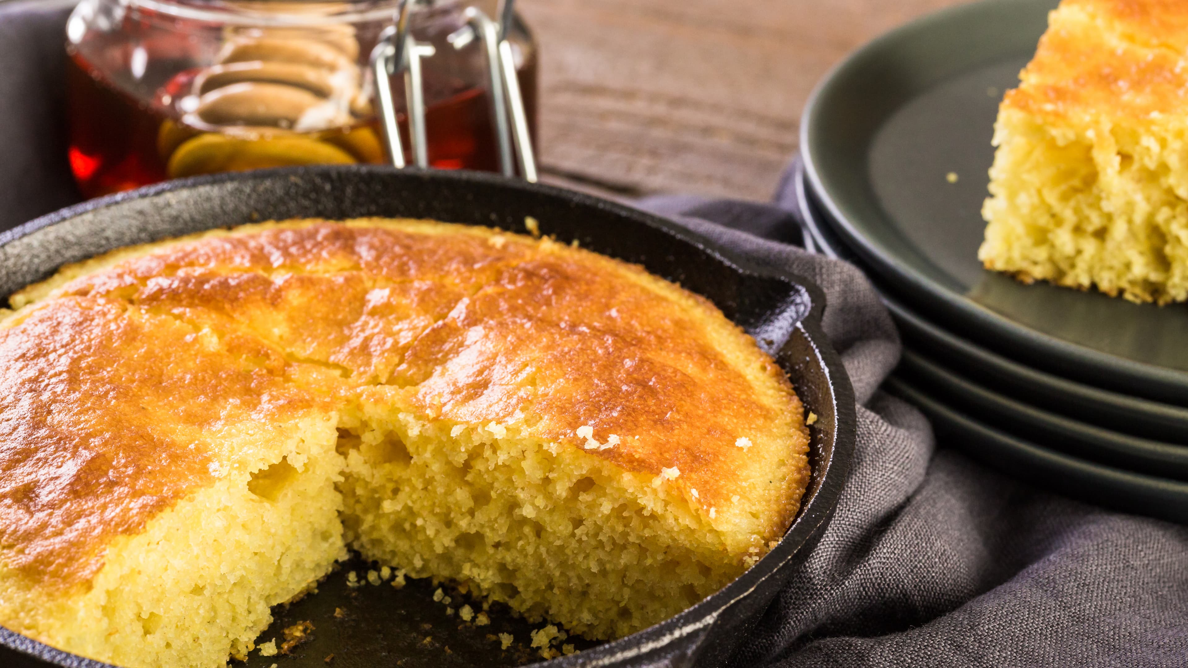 Sliced Aunt Jemima cornbread with honey