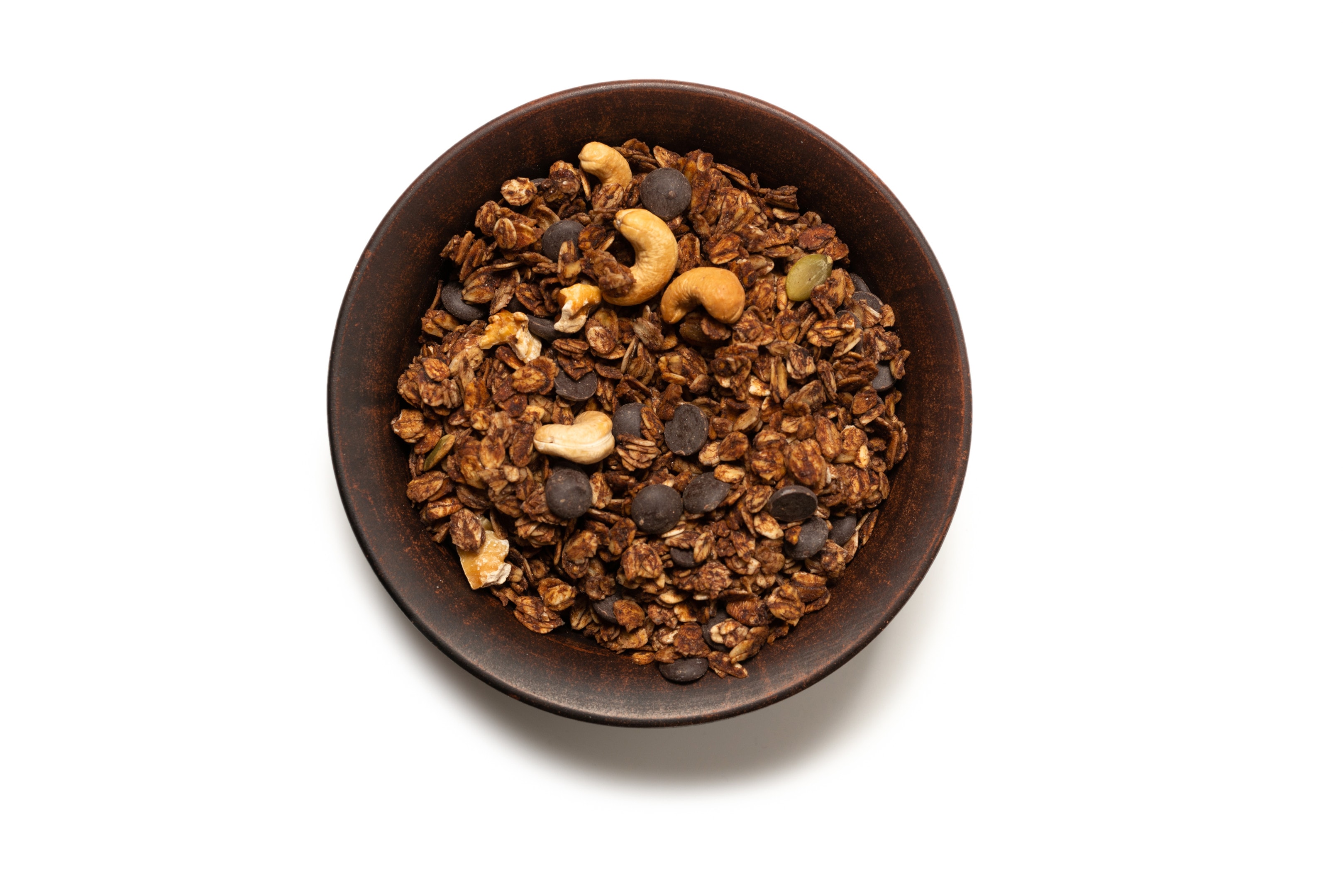 Whole grain oats granola cereal with seeds, nuts and dark chocolate