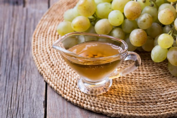 Balsamic vinegar and olive oil on wooden table