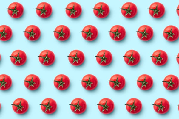 Cherry tomatoes on blue background