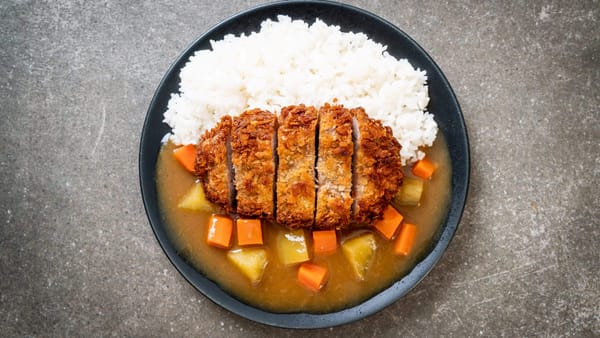 Crispy fried chicken cutlet with Coco's curry and rice