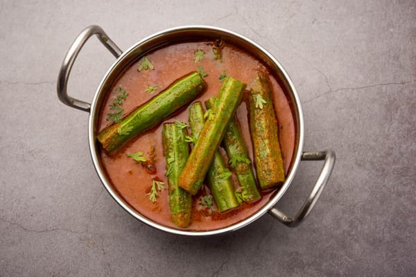 Indian drumstick curry — moringa sticks and spices curry which is prepared using <a href="https://blend-of-bites.ghost.io/prepare-moringa-oil/">moringa oil</a>