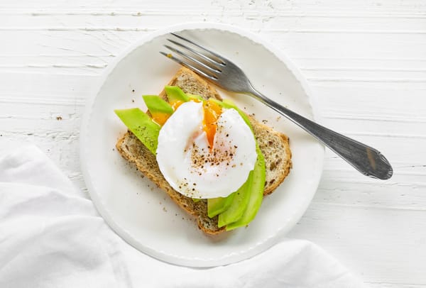 Sandwich with avocado and poached egg