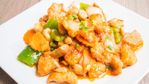 Sweet and sour chicken Jamaican style with cashew nuts