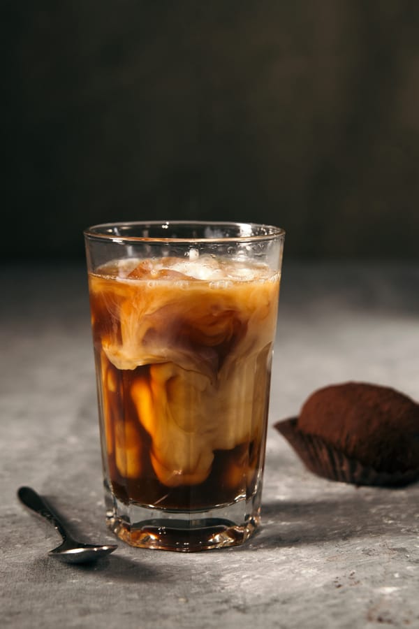 Iced coffee topped with cream