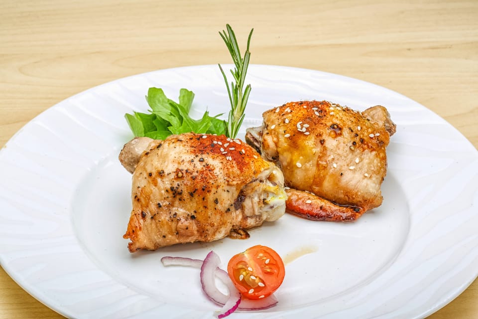 Boneless skinless chicken thighs air fryer with garnish