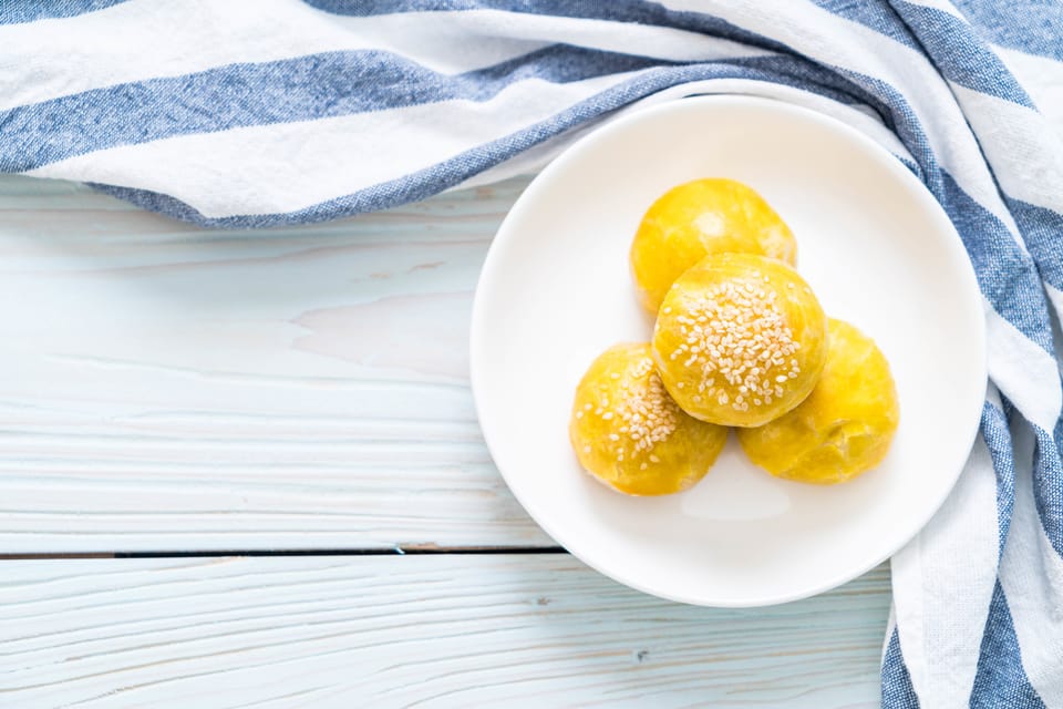 Caribbean conch fritters in white plate