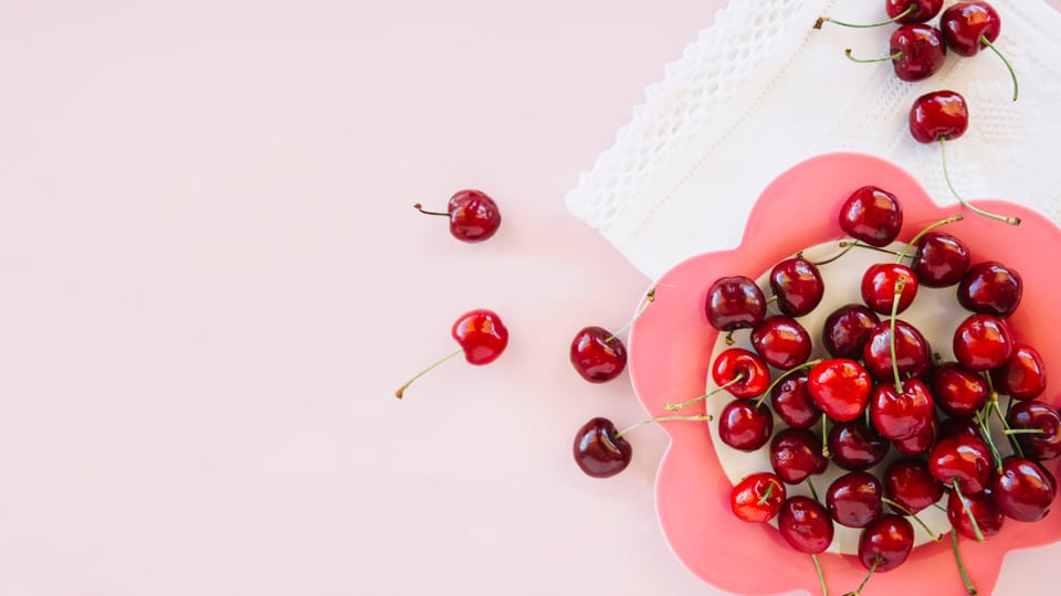 Fresh cherries on a plate