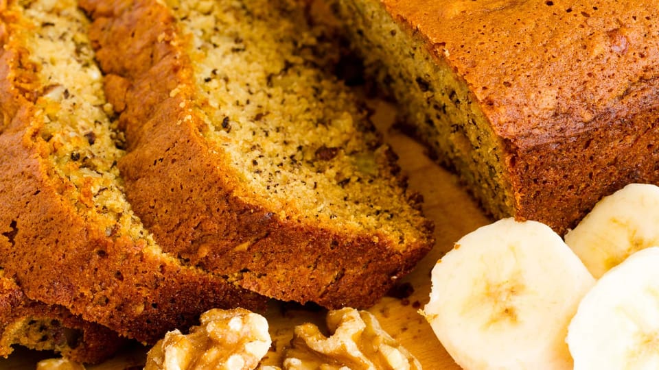 Freshly baked classic banana bread simply with walnuts and bananas