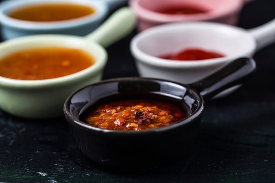 Homemade chili sauce in small bowls