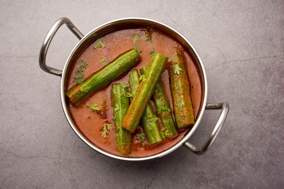 Indian drumstick curry — moringa sticks and spices curry which is prepared using <a href="https://blend-of-bites.ghost.io/prepare-moringa-oil/">moringa oil</a>