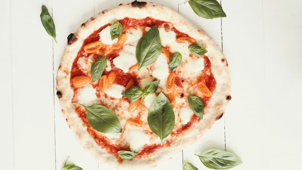 Tasty Vito Iacopelli pizza dough with tomatoes and basil