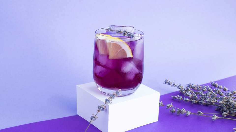 Violet sake with ice and lemon