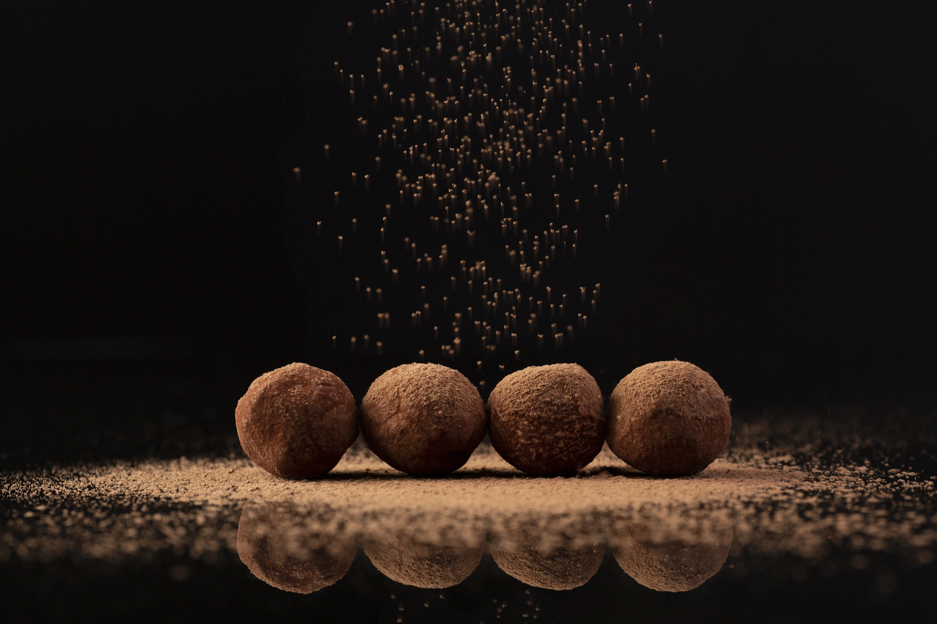 Cocoa sprinkled truffles