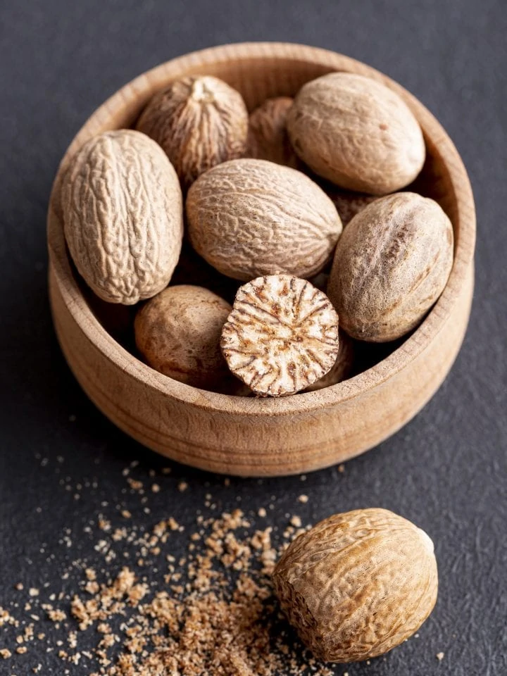 Nutmeg in wooden bowl