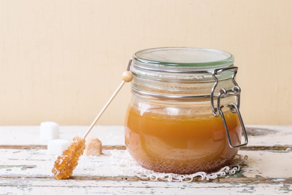 Brown sugar syrup sauce in glass jar