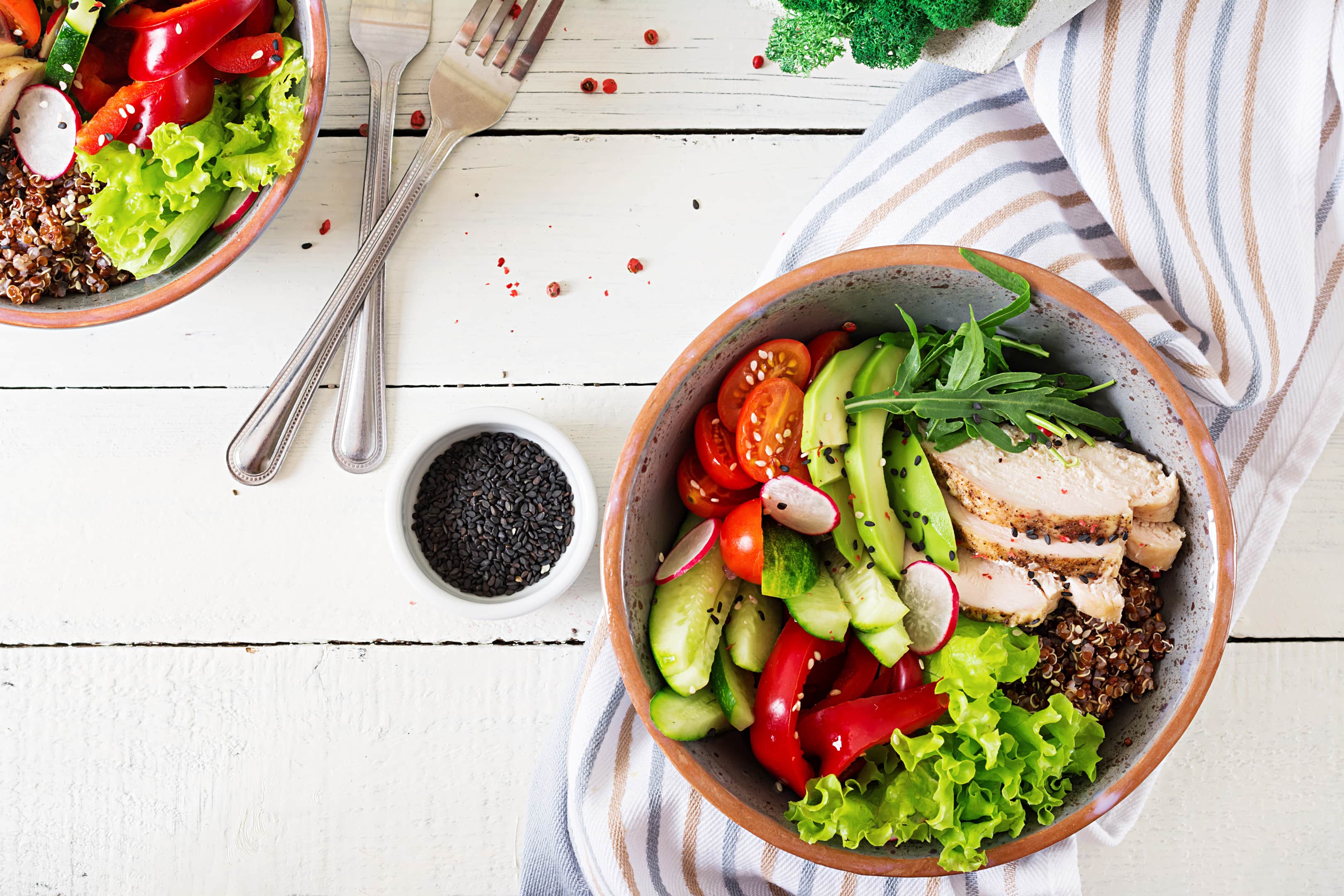 Buddha bowl dish with chicken fillet and quinoa