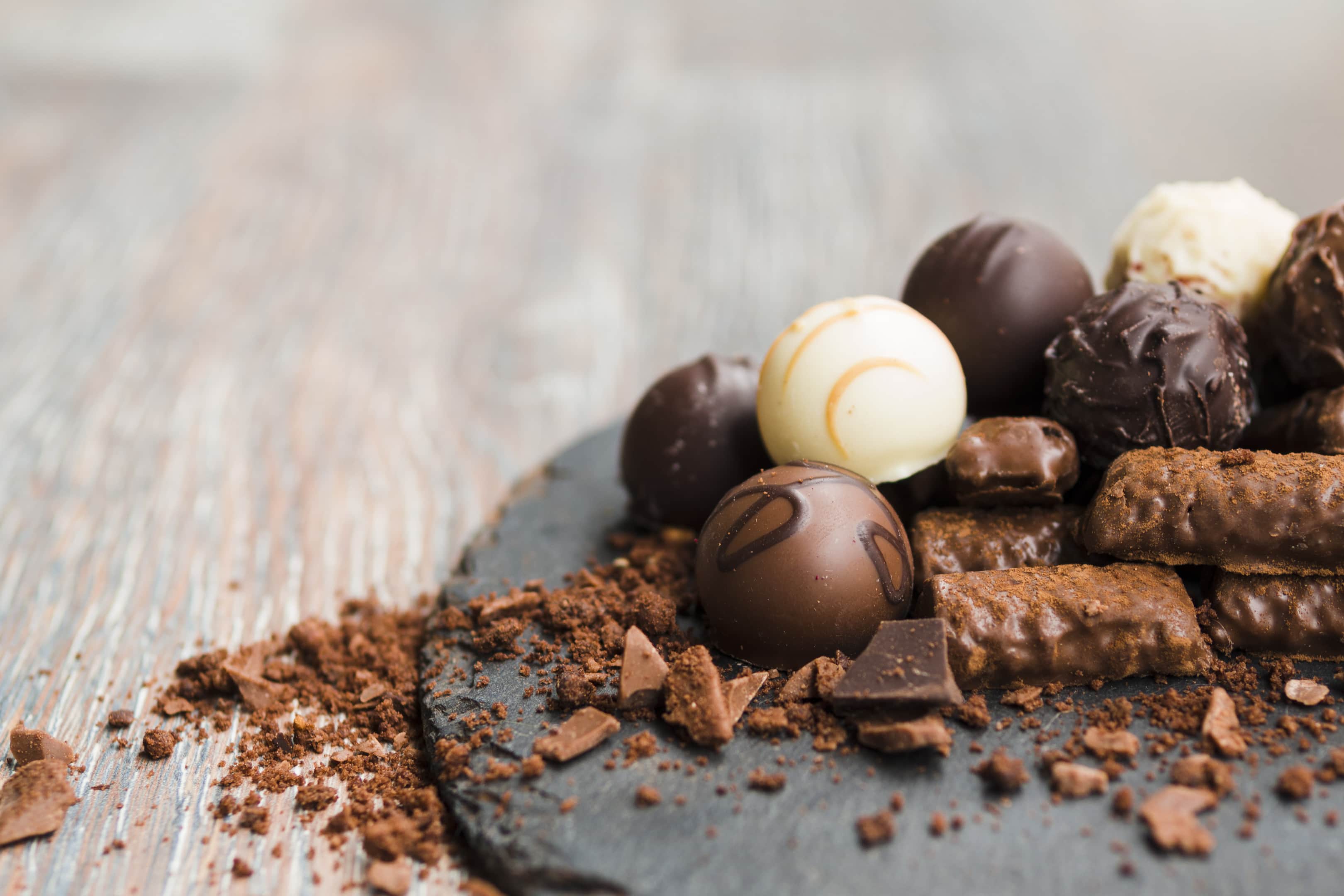 Delicious chocolates slate plate