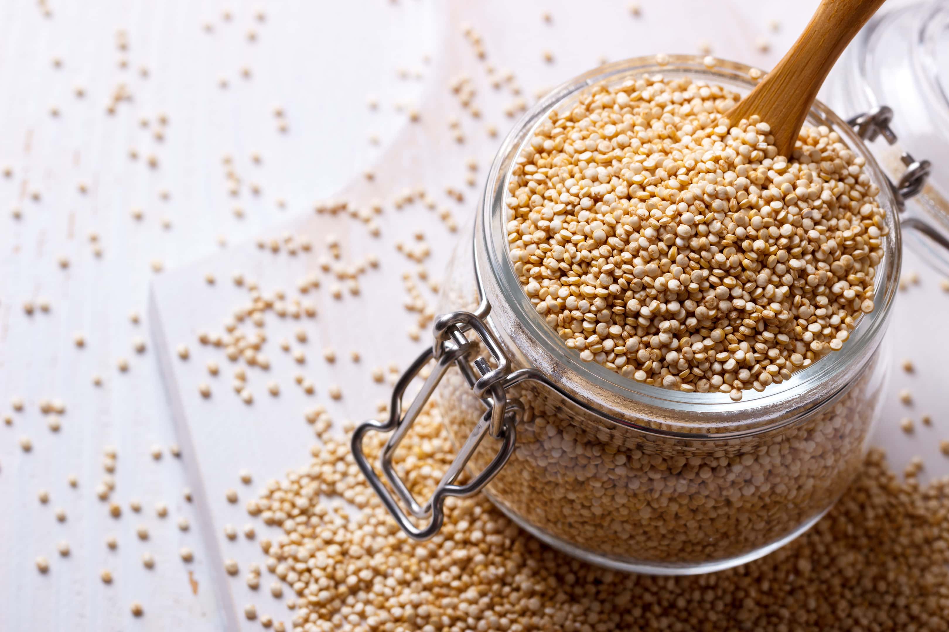 White quinoa seeds. Quinoa is one of our list of foods that make you taller