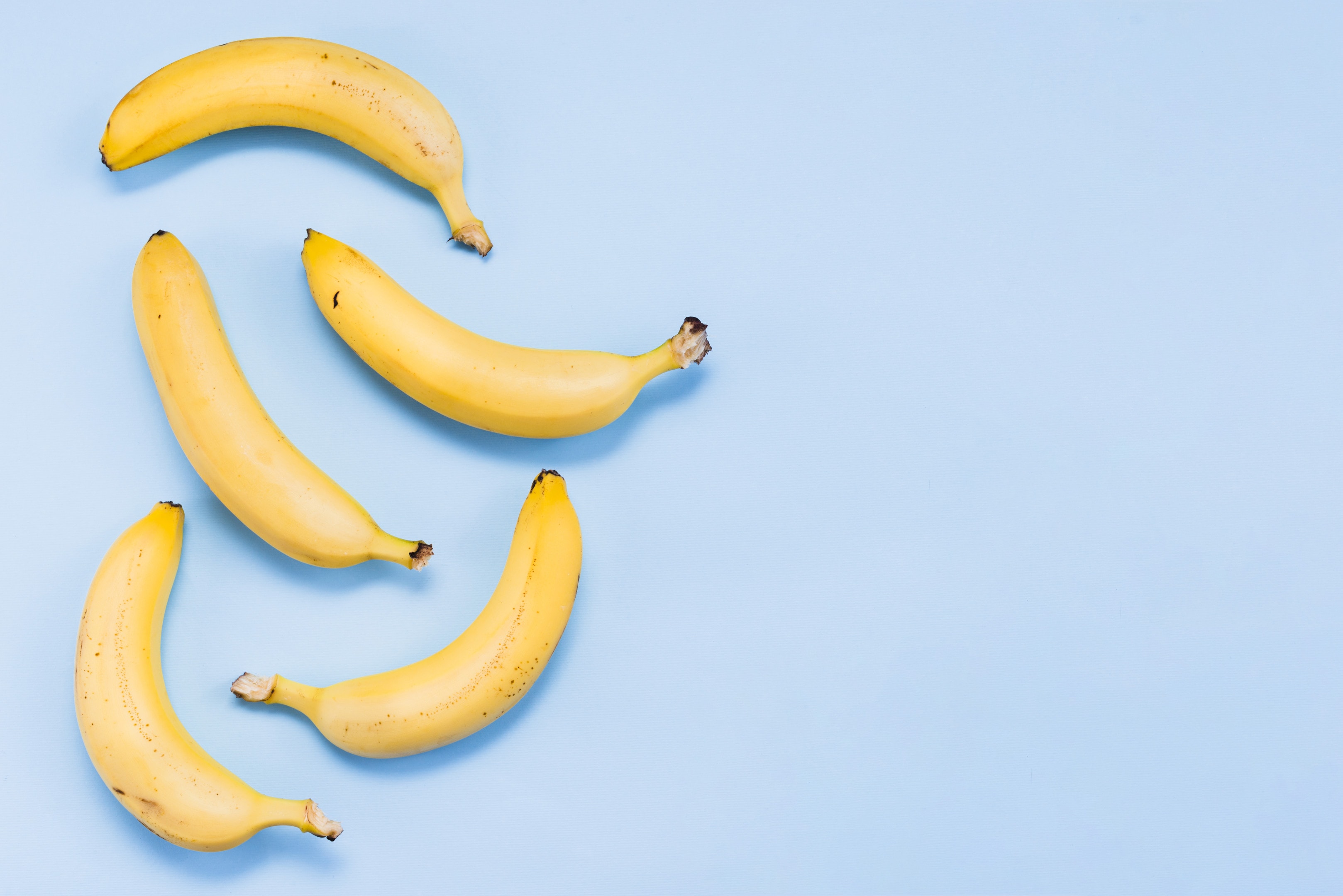 Bananas on blue background