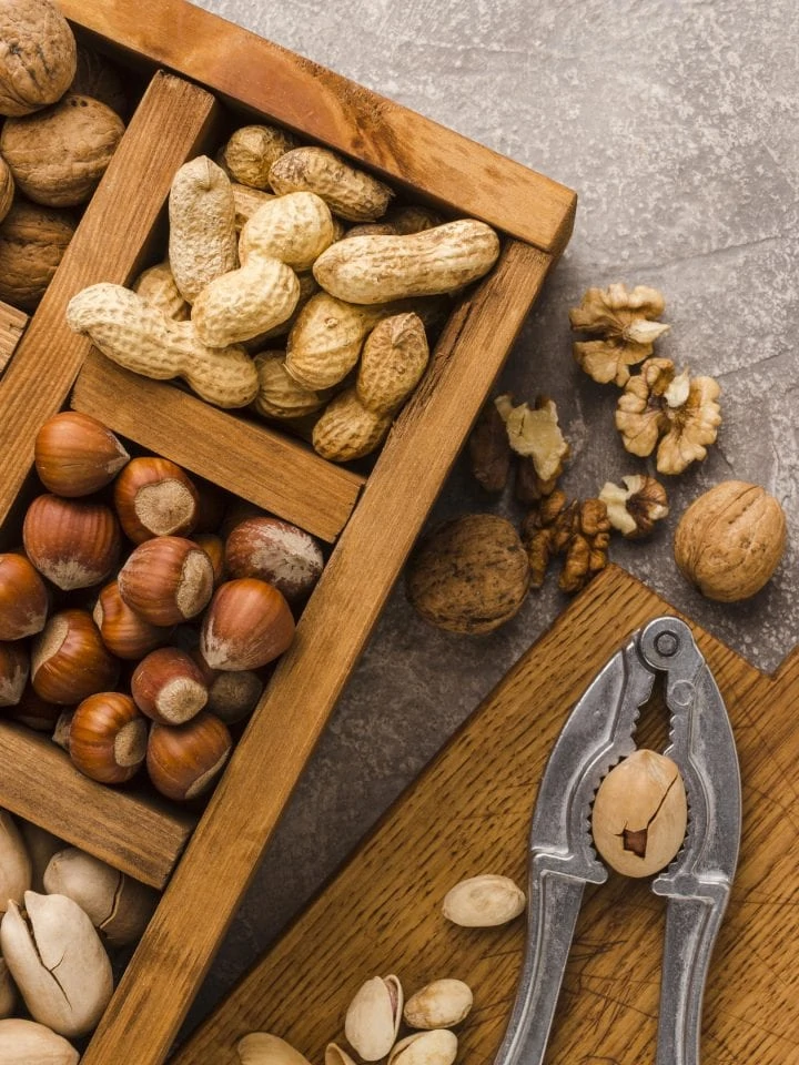 Different types nuts in wooden box