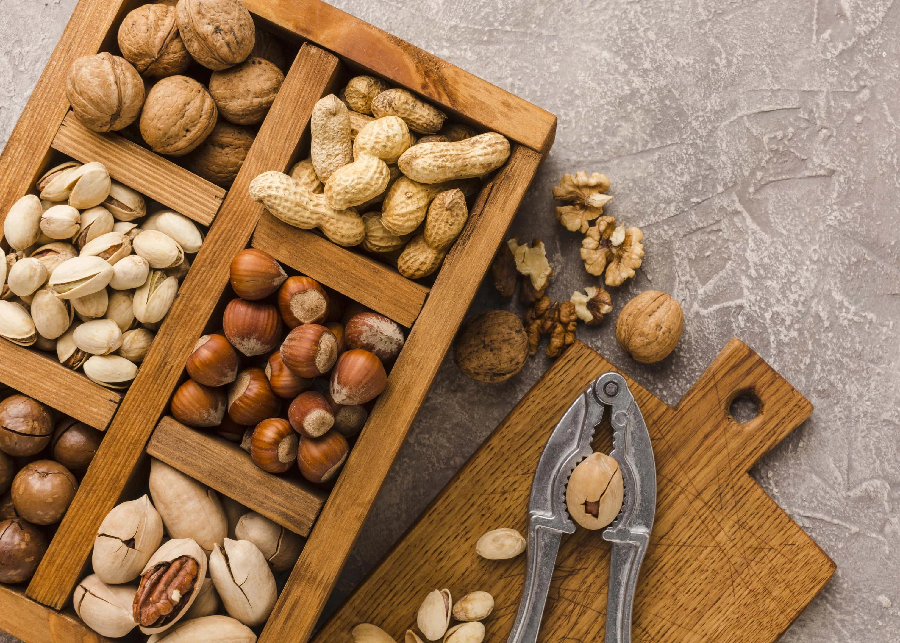 Different types nuts in wooden box