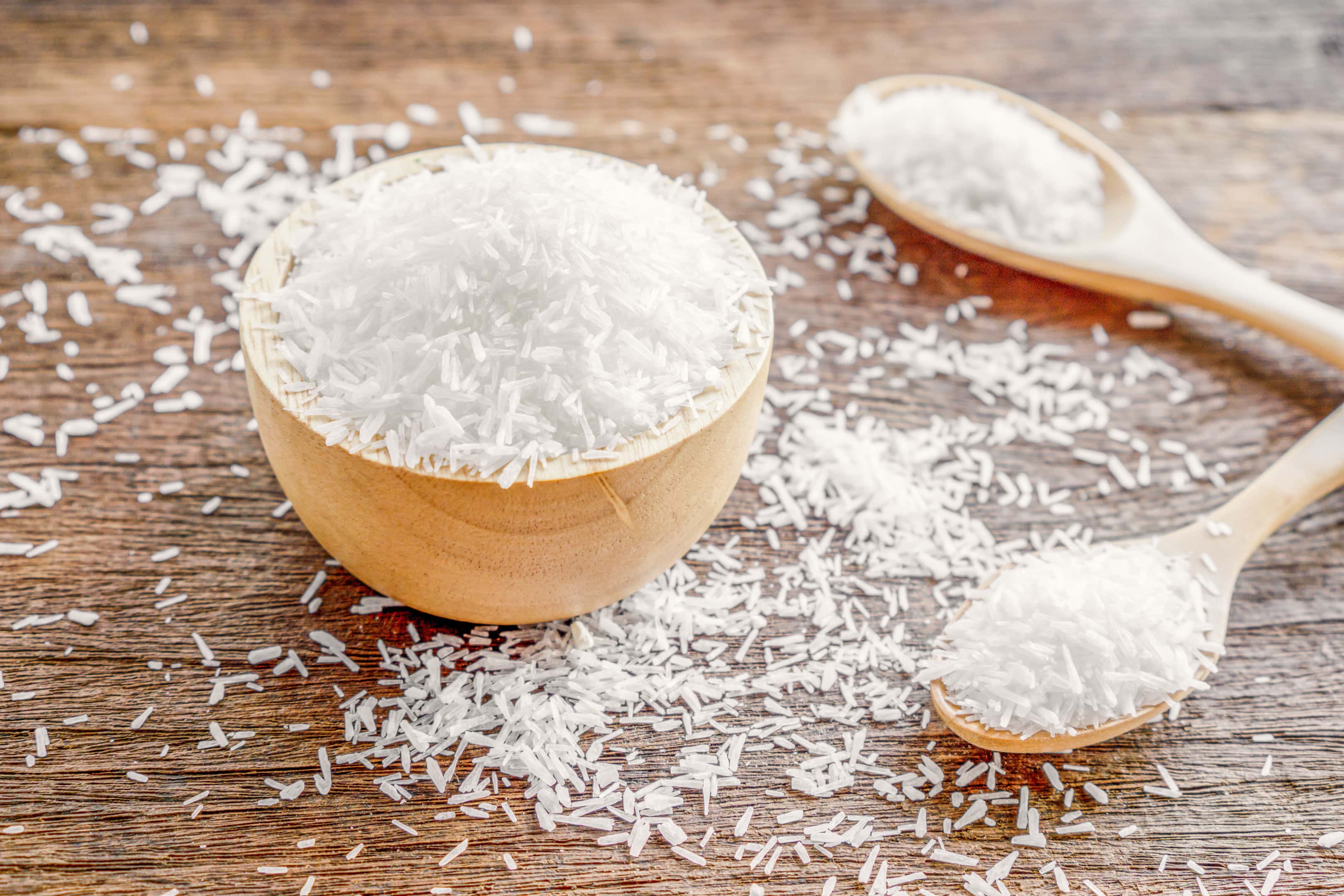 Monosodium glutamate in wooden bowl