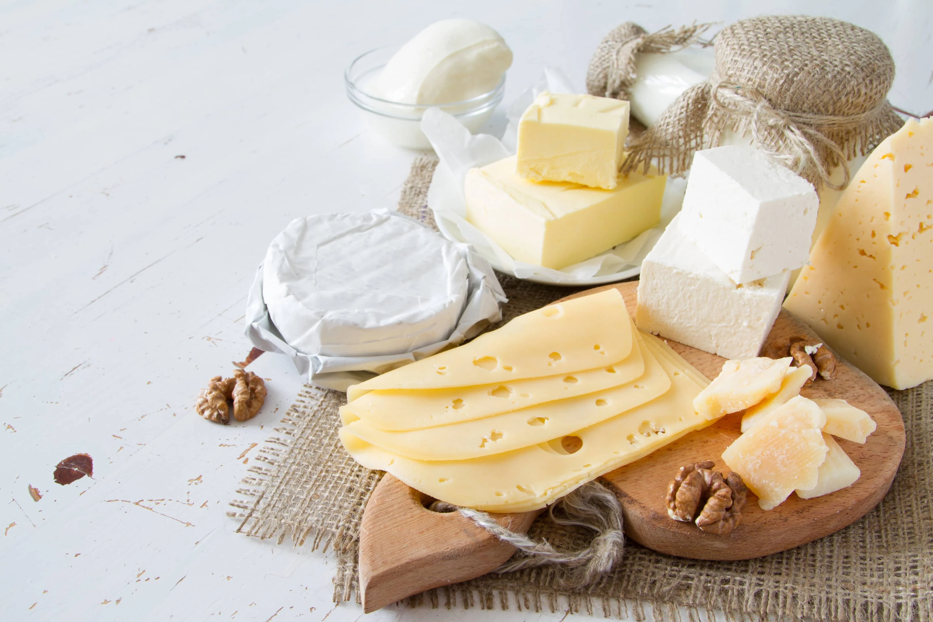 A selection of dairy products: cheese, milk and yogurt. Dairy is one on our list of foods to avoid before drug test.