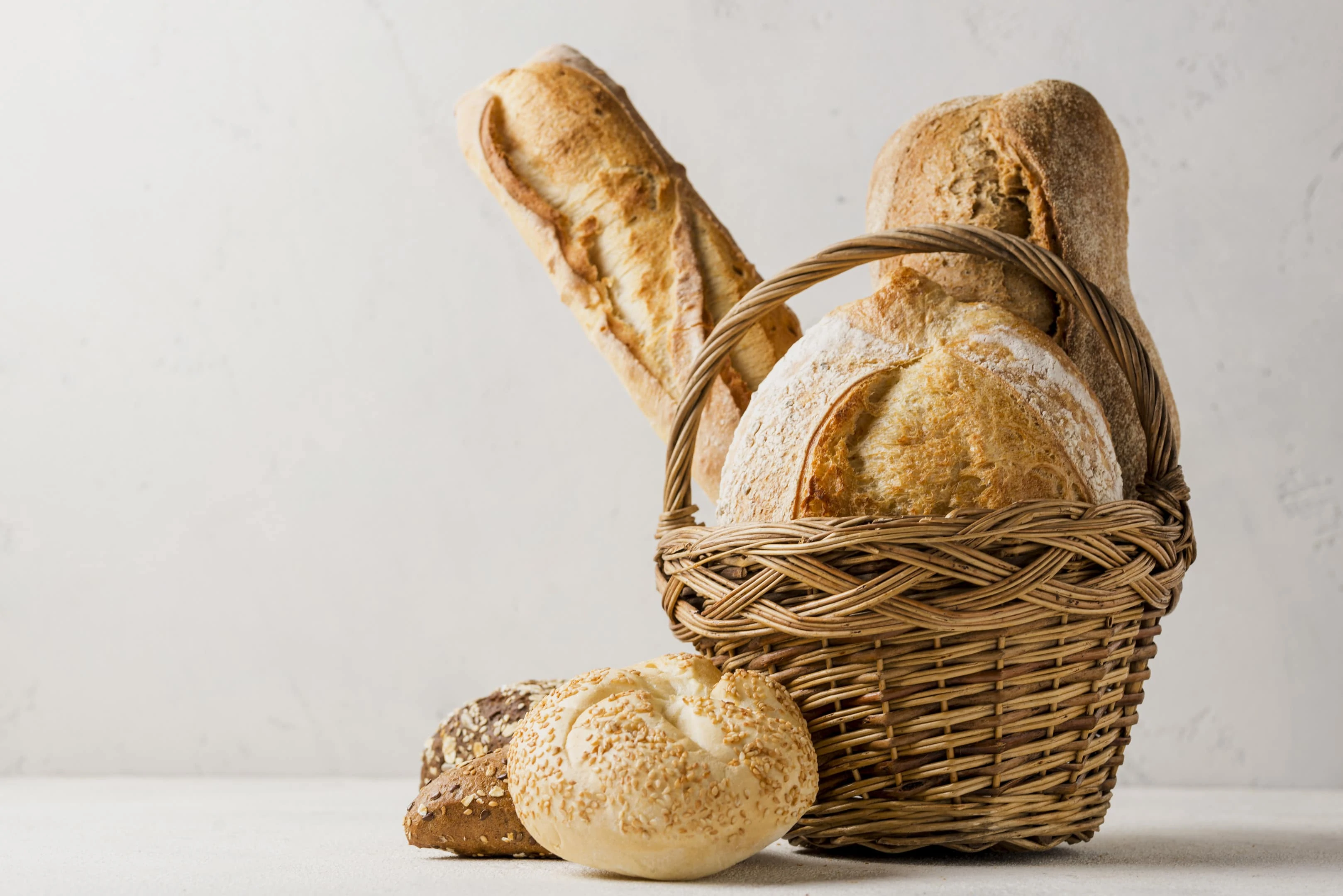 Basket with various white and whole grain breads