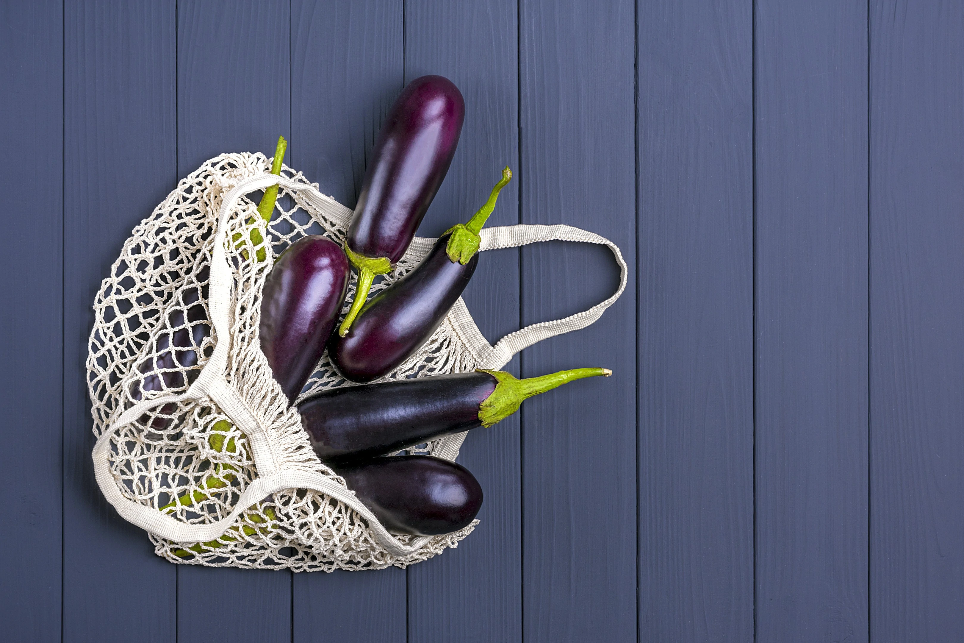 Freshly harvested eggplants. Eggplant is one on our list of food that starts with e.