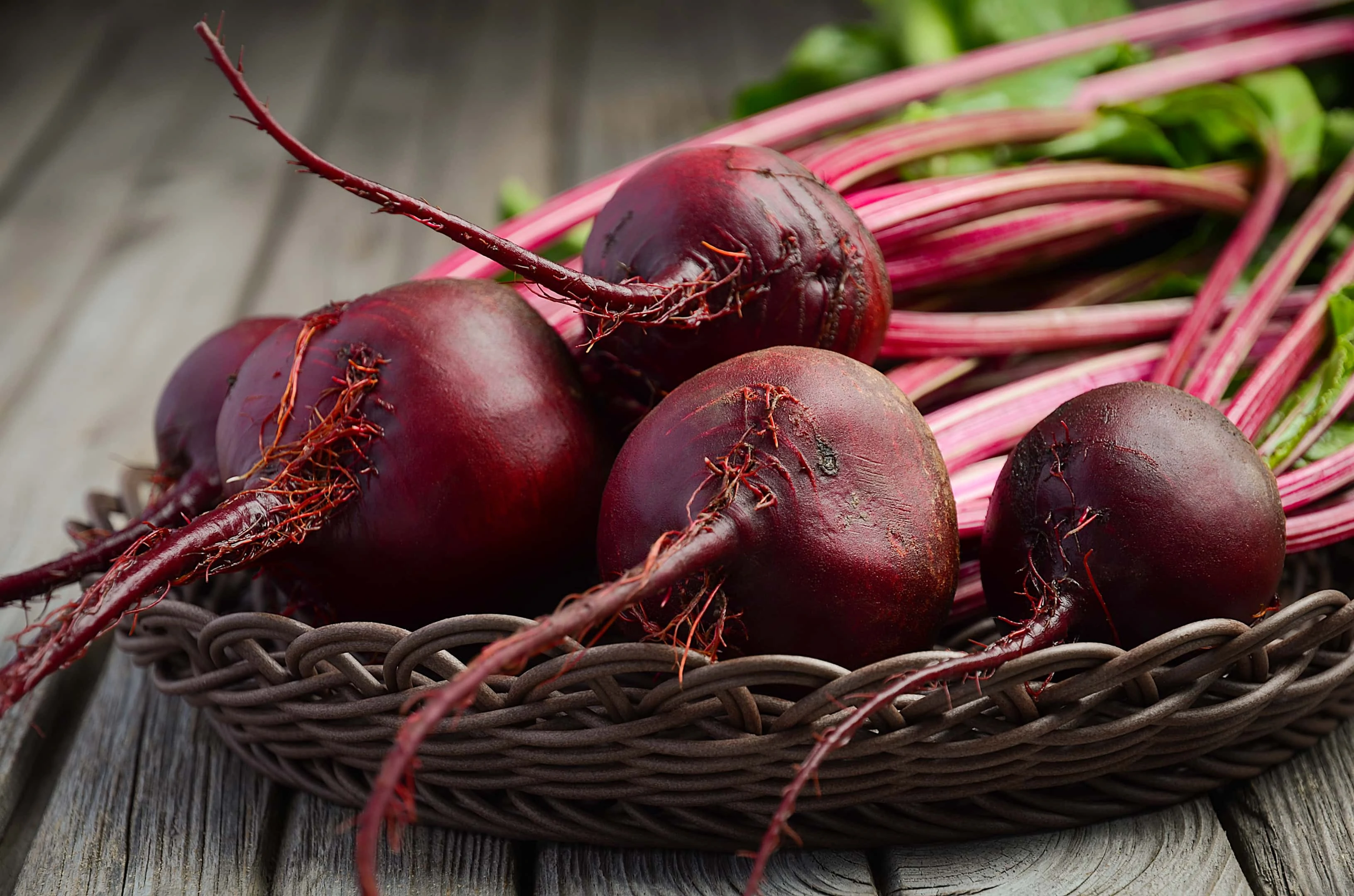 Fresh beets on rustic wooden table