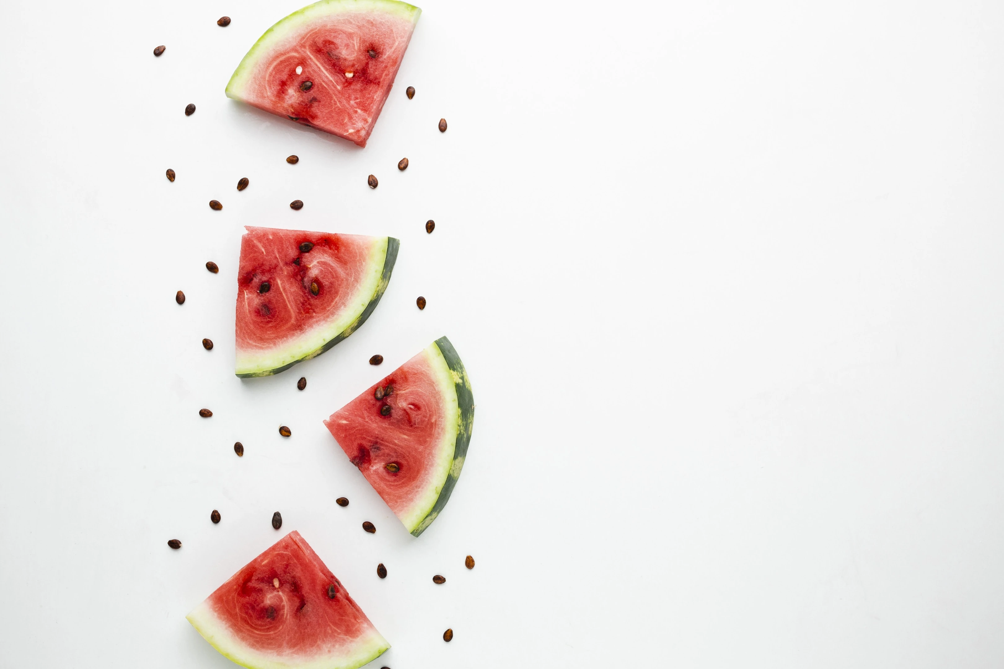 Sliced watermelon arrangement on white background
