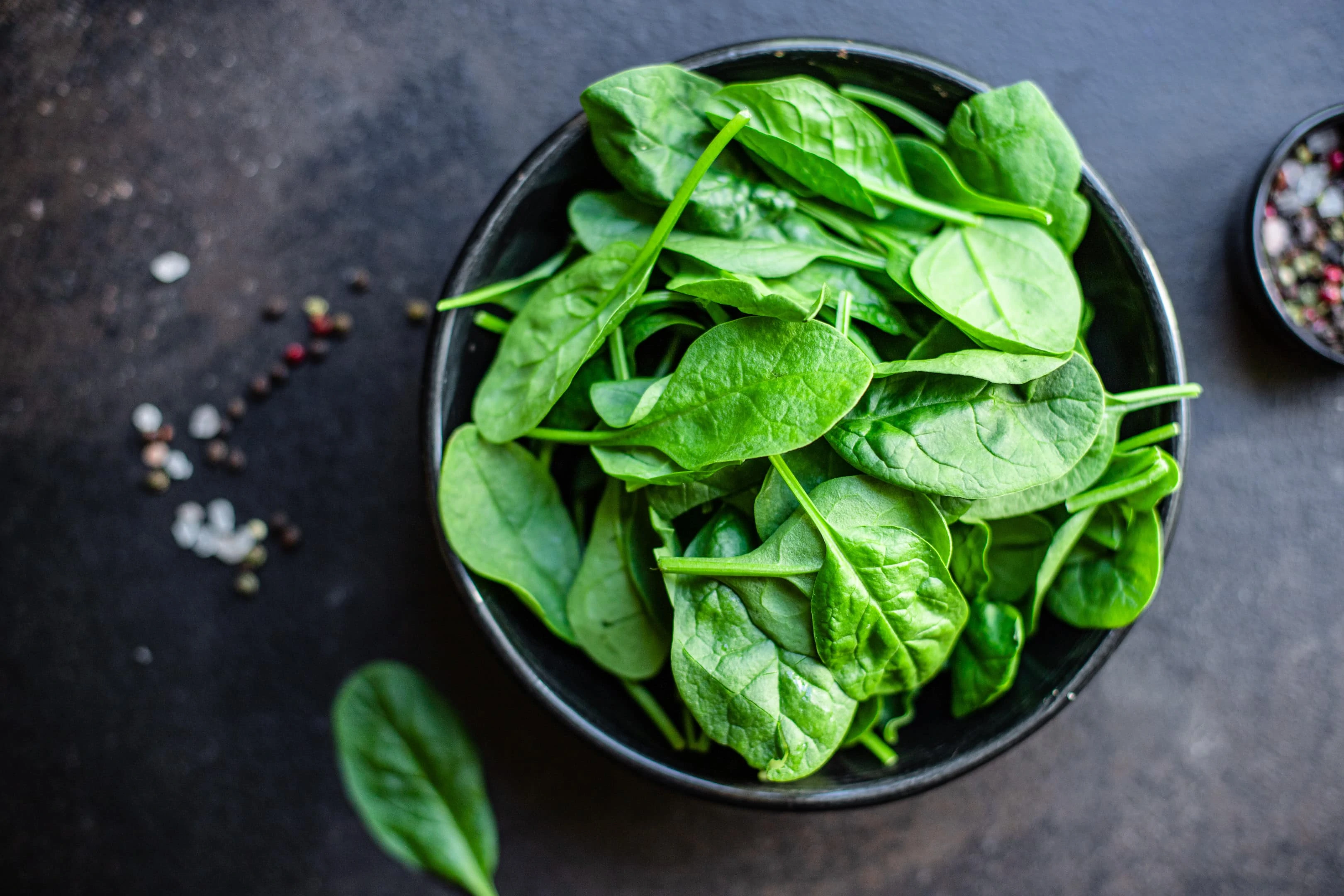 Fresh spinach leaves. Spinach is on our list of foods to reduce eye pressure.