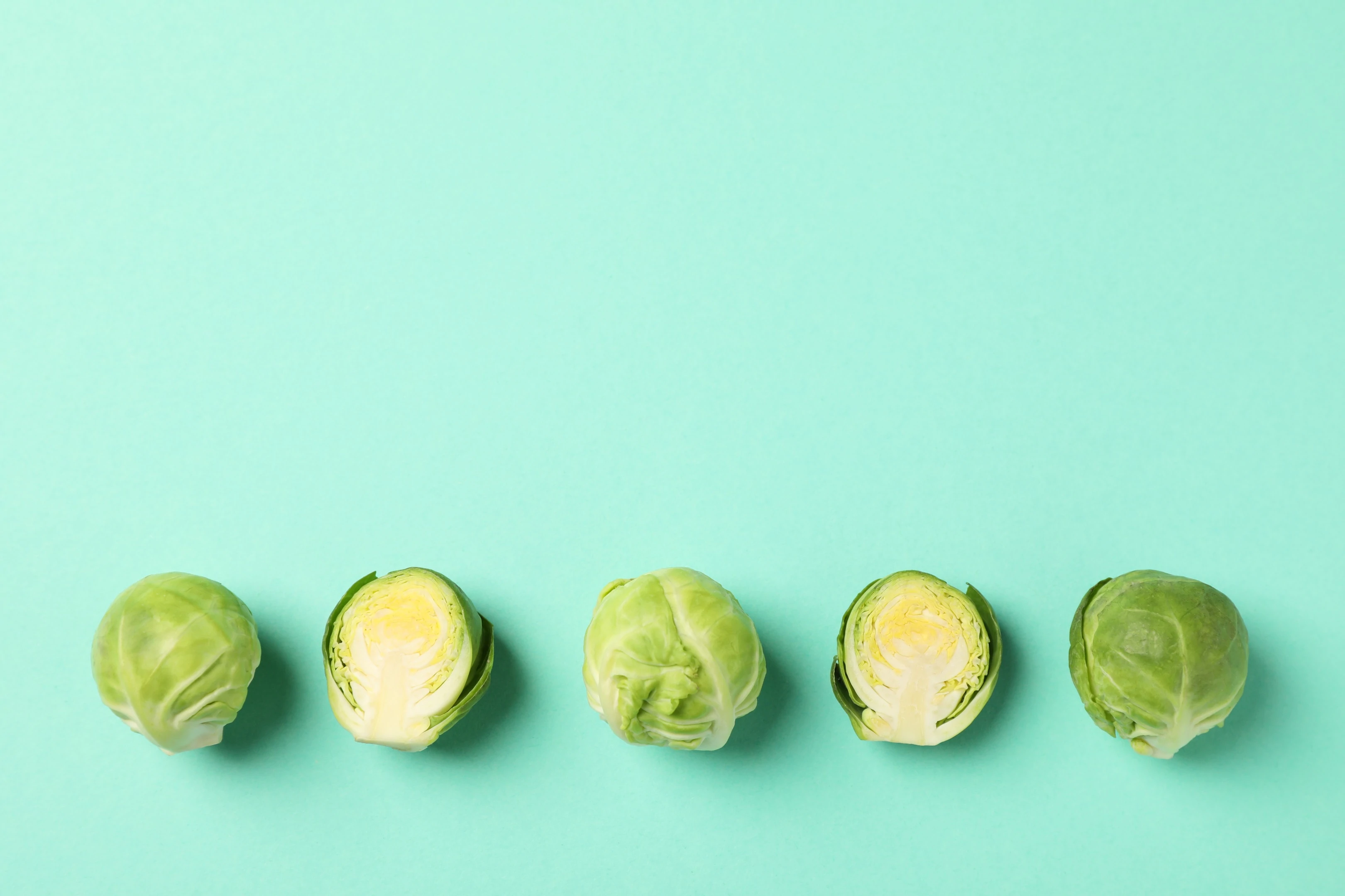 Fresh Brussels Sprout on Green Background