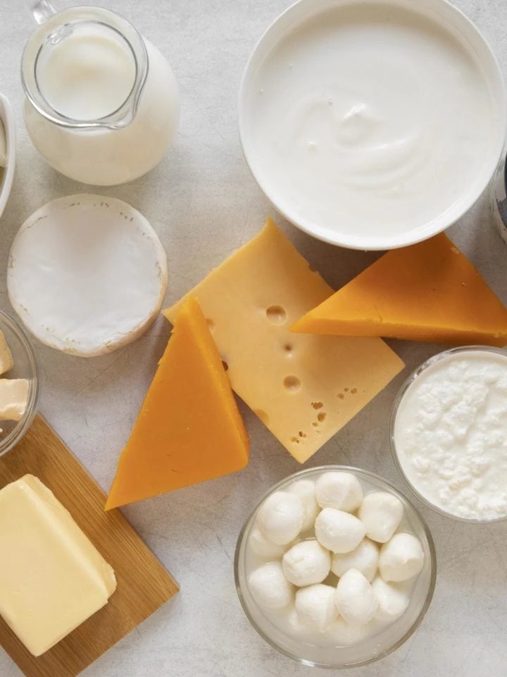 Dairy products assortment on white table