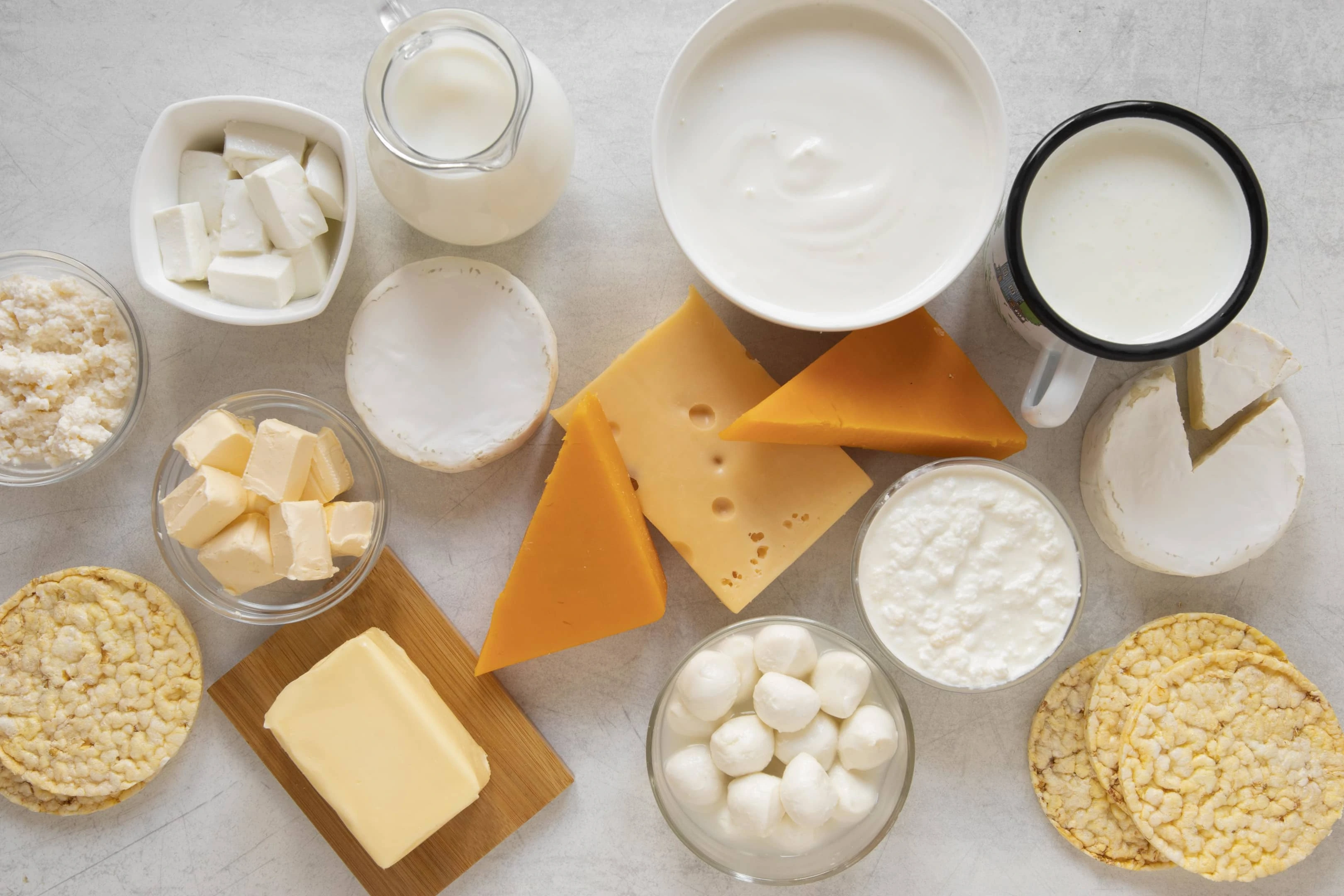 Dairy products assortment on white table