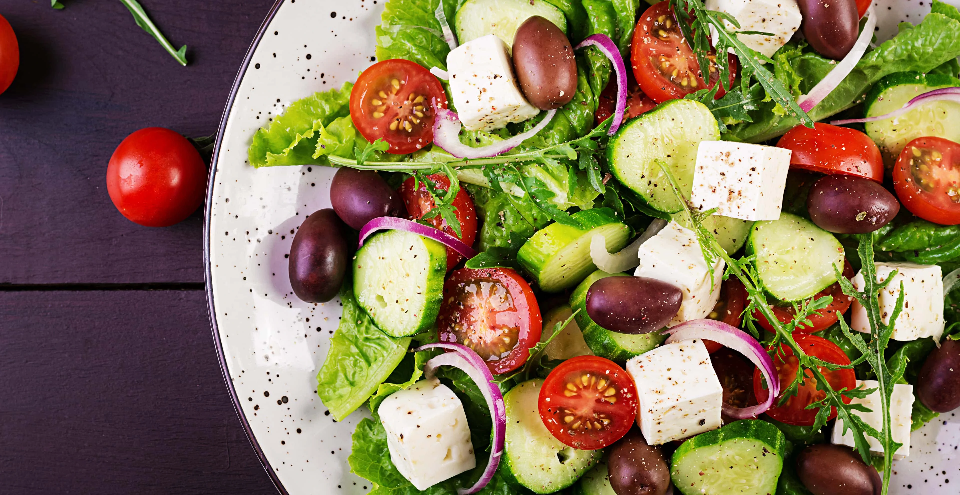 Mediterranean diet greek salad with fresh vegetables and cheese