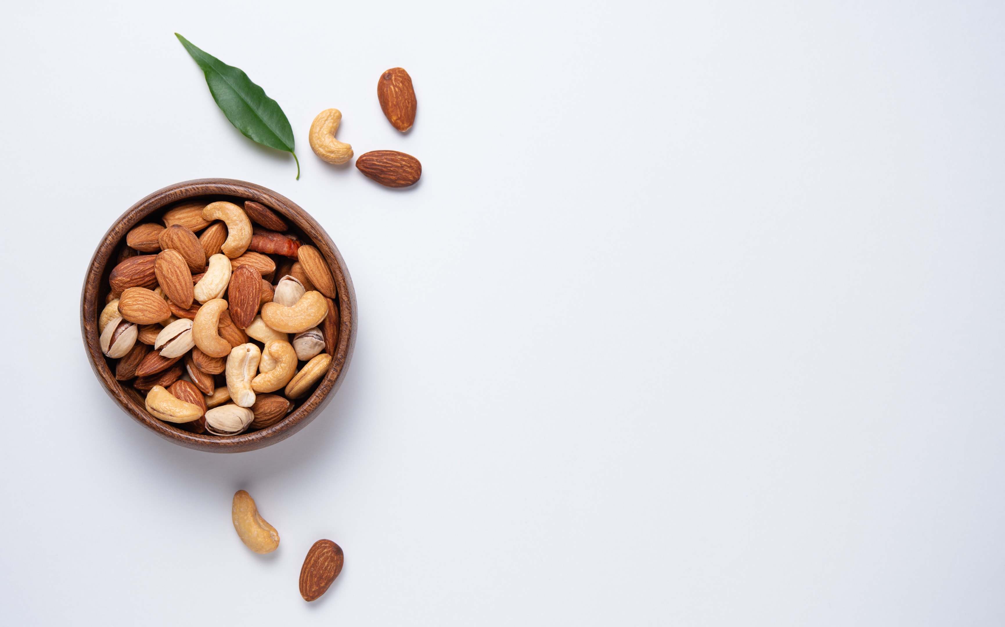 Nuts mix in wooden bowl